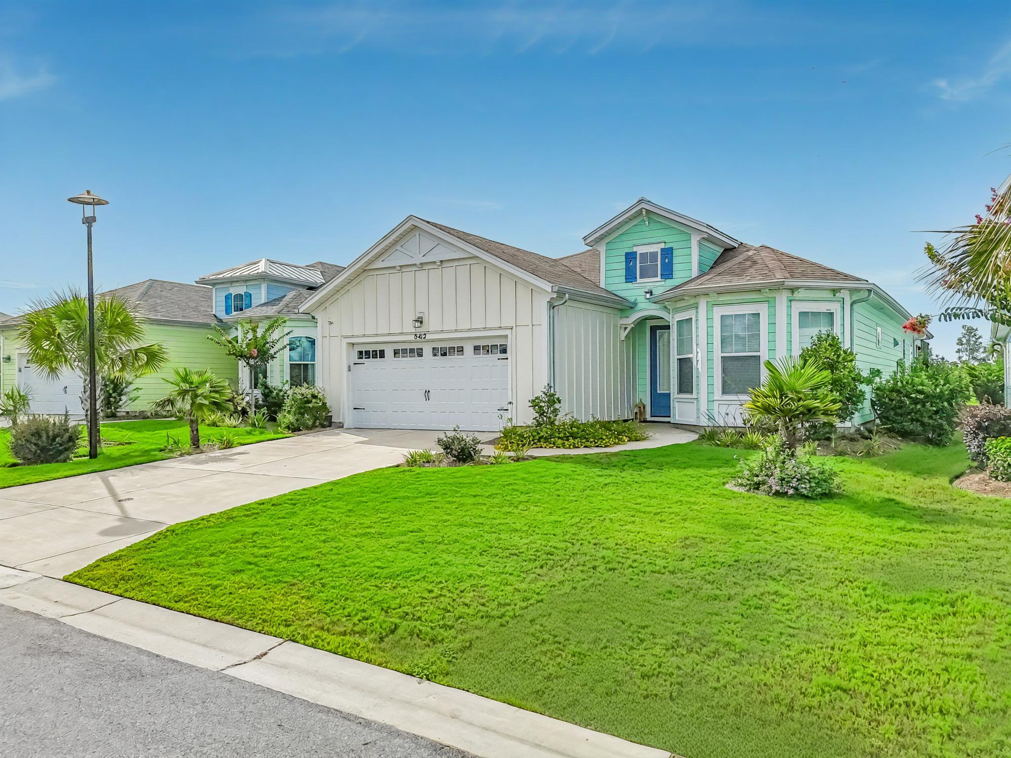 Assumable loan at 2.75% with 521k balance remaining! Welcome to 8412 Margarita Place, a pristine, like new pool home in the 55+ community of Latitude Margaritaville Watersound. This beautifully customized 3-bedroom, 3-bathroom Breeze Bay floor plan offers the perfect blend of luxury, functionality, and relaxed coastal living, all on a quiet cul-de-sac with no drive by traffic. Thoughtfully designed for both everyday comfort and entertaining, the home boasts an open, single-level layout with soaring 9' ceilings, 8' interior doors, and luxury finishes throughout. The heart of the home is the expansive quartz kitchen island, comfortably seating six and opening into a light-filled great room with vaulted ceilings, custom fireplace, and a wall of glass sliders that extend your living space to the fully screened lanai. Outside, enjoy your own private retreat featuring a custom pool with a hot tub, an extended tanning ledge, and elegant pavers, all overlooking the tranquil pond beyond. The primary suite is a peaceful haven with recessed ceilings, bay windows with water views, private pool access, and two spacious walk-in closets. The en-suite bathroom features double vanities and a large, tiled walk-in shower. Two generous guest suites each enjoy their own full bathrooms, ideal for visiting family or friends. Additional upgrades include Revwood Mohawk laminate flooring, premium tile selections, upgraded lighting and plumbing fixtures, recessed lighting, ceiling fans, quartz countertops throughout, security system with cameras, premium blinds, and more. This home has been meticulously cared for, lightly lived in, and fully inspected in 2024 with all warranty items addressed. Furniture is negotiable, including Polywood deck furniture, new beds, stylish living pieces, and more. The home also includes a 2-car garage and HOA-maintained landscaping, giving you more time to enjoy the community's resort-style amenities. Latitude Margaritaville Watersound is an exclusive gated community just 7 miles from the beach and less than 10 minutes from ECP Airport. Residents enjoy access to an on site restaurant, resort pool, pickleball and tennis courts, fitness center with lap pool and spa, music venues, clubs, and a vibrant social calendar. New amenities coming soon include a marina, shopping and dining village, theater, ceramics studio, workshop, and more. Just 3 miles from the new Tallahassee Memorial Healthcare campus and FSU College of Medicine extension. Don't miss this rare opportunity to own a like new, fully upgraded home with an assumable loan at 2.75% in one of the area's most exciting communities.