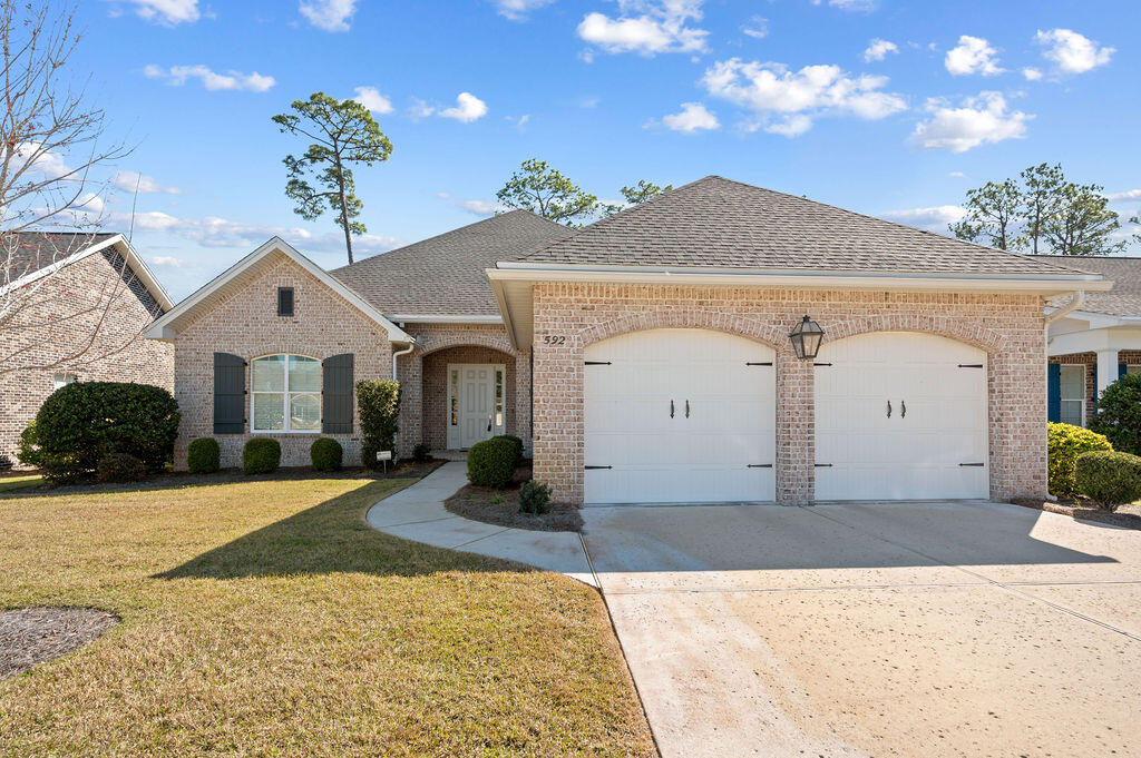 Step into this stunning 4-bedroom, 3-bathroom brick home, where comfort, style, and functionality come together perfectly. Centrally located and designed with modern living in mind, this home offers an inviting, open layout that's both spacious and warm. As you enter, you'll be greeted by beautiful shiplap siding and wood beams that create a charming, rustic atmosphere. Built in 2020, this home boasts a thoughtfully designed floor plan and high-end finishes throughout. The kitchen is a chef's dream, featuring sleek quartz countertops, a gas cooktop, stainless steel appliances, a breakfast bar, and a cozy kitchen nook. Soft-close cabinet drawers and ample storage add both style and practicality to the space. The main living areas are highlighted by stunning wood flooring, while tile flooring enhances the bathrooms, and plush carpeting provides comfort in the bedrooms. The home is beautifully appointed with 8-foot doors, raised ceilings, and crown molding, giving the entire space a luxurious feel. The intelligently designed split-bedroom layout ensures privacy for all residents, with an additional bedroom and ensuite perfect for guests or multigenerational living. A quiet, tucked-away office space near the laundry room offers a peaceful retreat for work or study.
The spacious primary bedroom is flooded with natural light, creating a serene atmosphere. The attached ensuite is a luxurious escape, complete with double vanities and a large tiled shower, offering the perfect space to relax and unwind.
An enclosed porch adds extra living space, seamlessly connecting the indoor and outdoor areas. The oversized garage provides plenty of room for vehicles and storage, rounding out the many features of this remarkable home.
Don't miss the chance to make this your forever home. Schedule a showing today and start envisioning all the possibilities!
________________________________________