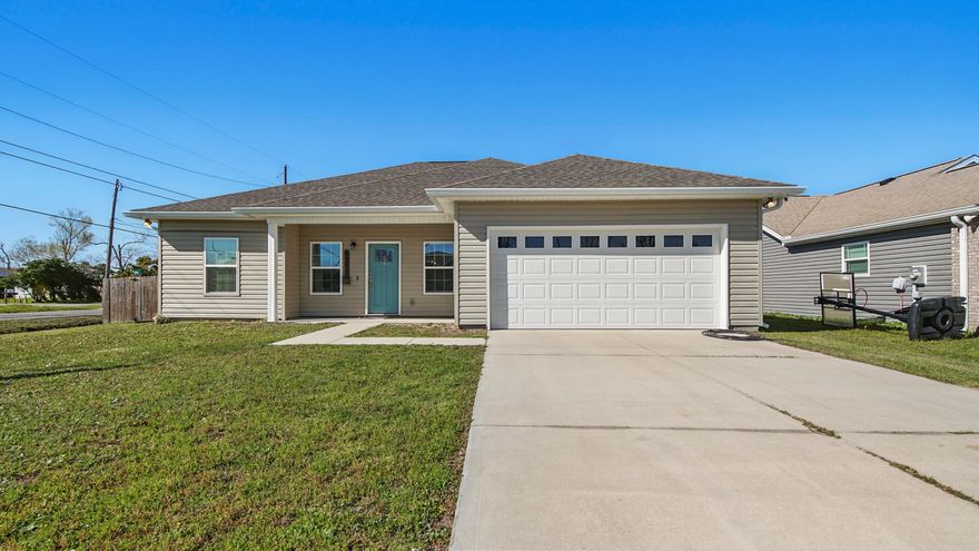 Beautiful Newer home on great corner lot, Close to Tyndall AFB, shopping, public transportation & Lots of Restaurants. This home offers Tile thru out living area and carpet in bedrooms, Custom Cabinets.  Home has easy to care for Vinyl Siding, Open living area and is just waiting for a new family to call it theirs.... Don't miss it call me today for more information