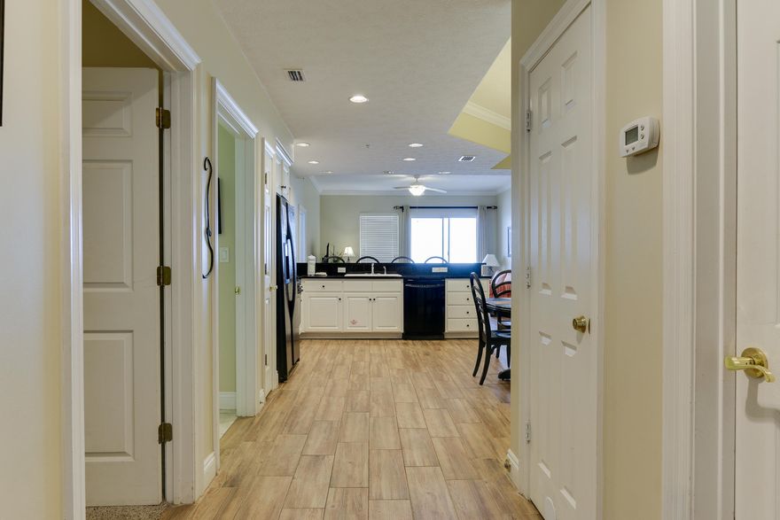 If you are looking for a one of a kind property and a terrific investment look no further! This highly sought After, 2 Bed/2 Bath condo on the 3RD floor of Treasure Island and has one of the BEST VIEWS on Panama City Beach! Enjoy sunrise views in the morning and Sunset views in the evening! The layout of this over-sized condo's interior is superb for entertaining, offering 10' ceilings through-out and an excess of space and features!! THIS UNIT IS ON THE 3RD FLOOR OF THE DEVELOPMENT, THE SAME FLOOR AS THE PARKING GARAGE ACCESS, SO NO ELEVATOR IS NECESSARY! Simply park on the garage's 3rd level and walk over the sky bridge to the unit. The pet friendly complex has a large heated pool and a kiddy pool and two gazebos, covered parking, four high-speed elevators, fitness room