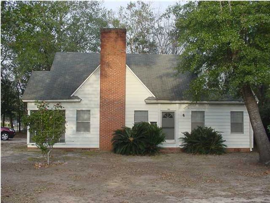 Nice older home with lots of wood on floors and walls. 10 foot ceilings. 2 bedrooms downstairs and 2 bedrooms upstairs. House updated with central gas heating and A/C. New Tile throughout the home. Come see this home today!