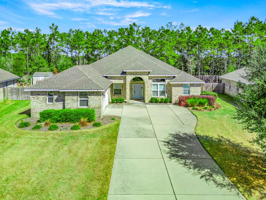 Stunning 3238 SF home with soaring 12' ceilings in Sweetwater of Hammock Bay!  This 4BR/3BA home has over 38K in custom upgrades, separate dining room, enclosed office, flex room/ bunkroom complete with custom designed and built system with four full sized beds. In the spacious gourmet kitchen you'll find stainless appliances, large island with single basin sink, 42'' tall cabinets, slate backsplash, walk-in pantry, butler's pantry/coffee bar, and a gas cooktop with wall oven which will make for a very happy chef! The home has vinyl plank floors with plush, almost new carpets in the bedrooms. The wonderful Primary Suite has an entry foyer and  bath with separate shower ,jetted tub ,dual vanities and a large walk-in closet . The laundry room is a dream complete with a large amount of cabinet space ,sink ,laundry bar fashioned with a clothes hanging system . There is plenty of room for a spare fridge or freezer. The interior of the home has been newly painted. Open floor plan flows very well, with kitchen/ breakfast/living area adjoining a wide, screened lanai and a fenced yard. This is the perfect home for entertaining with endless possibilities. Book your showing appointment today.
 Hammock Bay community offers extensive amenities to include: pools, tennis/pickle ball/basketball courts, walking trails, fitness center, community park areas, and much, much more. Buyer to verify all info deemed important