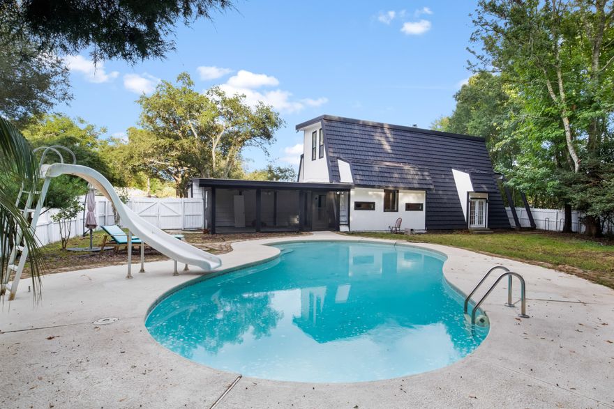 PRICE IMPROVEMENT!!! MOTIVATED SELLER COMES WITH ADDITIONAL LOT WHERE YOU CAN BUILD A SECOND HOME.This spacious 4-bedroom, 2.5-bath house in Navarre, Florida, offers the perfect blend of modern updates and ample space for your family. The interior has been painted throughout in a neutral color palette, creating a fresh and inviting atmosphere with its new LVP flooring, updated septic tank, and the bonus of a second lot for potential development. The master is conveniently located on the main floor, featuring a private en suite. Beyond the house, you'll find a spacious yard that has an enclosed porch and refreshing pool.