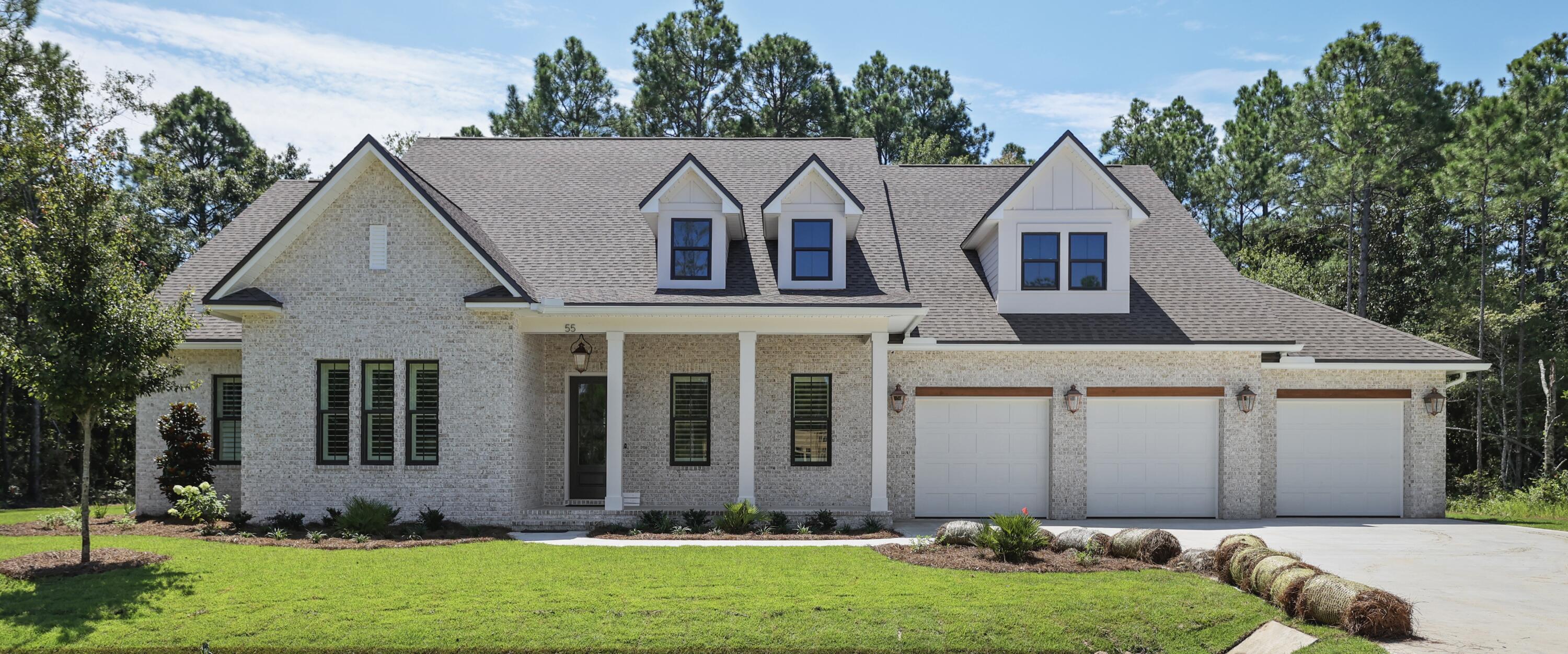 Gorgeous NEW Randy Wise home! Welcome home to 55 Pheasant Way in Hunter's Run. Hunter's Run is a new Randy Wise Development in Santa Rosa Beach that has generous sized lots, and exclusive homes. This home features 4 bedrooms, 3 full baths, large open floor plan with separate breakfast nook with brick accents, fireplace, custom furniture grade cabinets by Wood Harbor, 10 Ft ceilings throughout, upgraded hardwood floors, quartz countertops, solid core doors, shiplap, cased windows, plantation shutters, and custom brick archways. The exterior of the home is 4 sides brick with gas lanterns, beams over the 3 car garage, covered front porch with bead board ceiling, and a large outdoor back porch with summer kitchen.