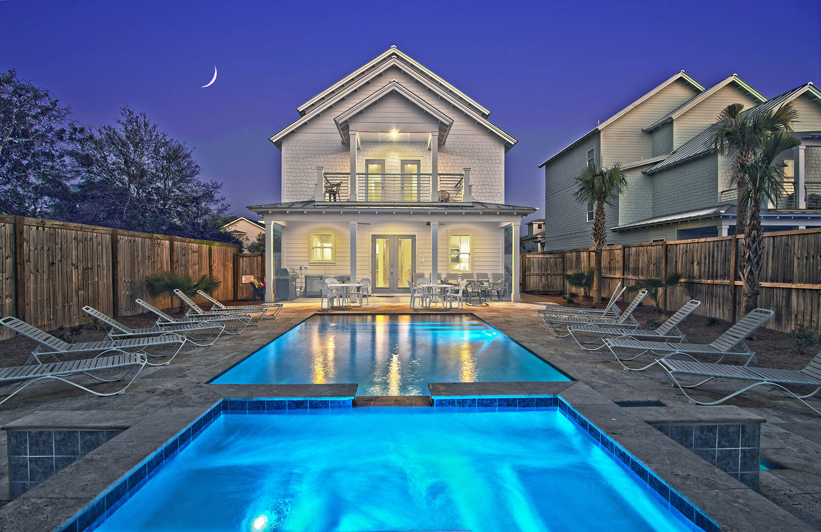 RENTAL MACHINE and ready to earn more than a 16% annual cash return for its new owner. This pristine beach house, just completed in 2019, is turn key ready to make you money and memories. This home was designed with maximum rental potential in mind and is poised to gross over $228,000 per year: each of the eight bedrooms has its own ensuite bath and balcony and the backyard boasts a resort style oasis containing a heated swimming pool, waterfall spa and outdoor kitchen. For rainy days or late night fun, the game room is equipped with a pool table and wet bar. The kitchen and living area is open concept, wonderful for entertaining large groups. All of this just a short 3 minute stroll to the beach! Make an appointment to see it today.