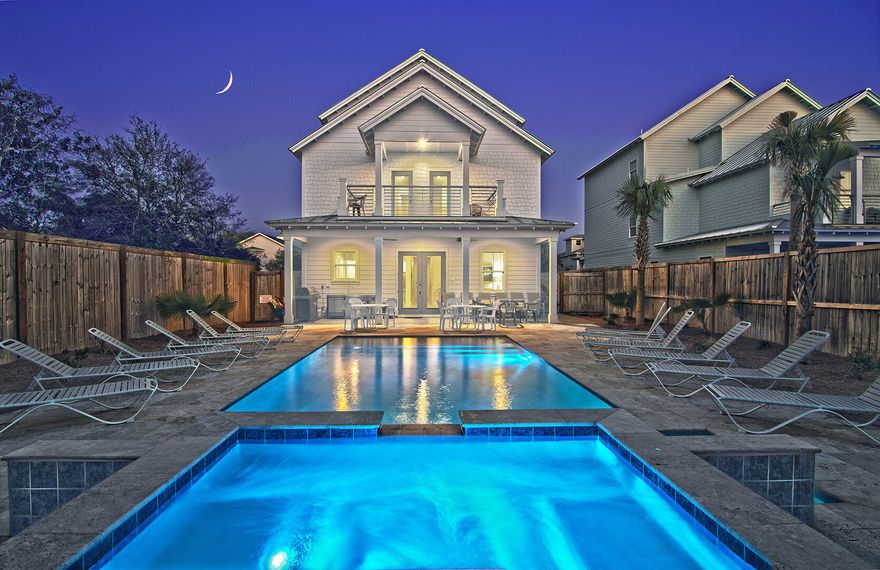 RENTAL MACHINE and ready to earn more than a 16% annual cash return for its new owner. This pristine beach house, just completed in 2019, is turn key ready to make you money and memories. This home was designed with maximum rental potential in mind and is poised to gross over $228,000 per year: each of the eight bedrooms has its own ensuite bath and balcony and the backyard boasts a resort style oasis containing a heated swimming pool, waterfall spa and outdoor kitchen. For rainy days or late night fun, the game room is equipped with a pool table and wet bar. The kitchen and living area is open concept, wonderful for entertaining large groups. All of this just a short 3 minute stroll to the beach! Make an appointment to see it today.
