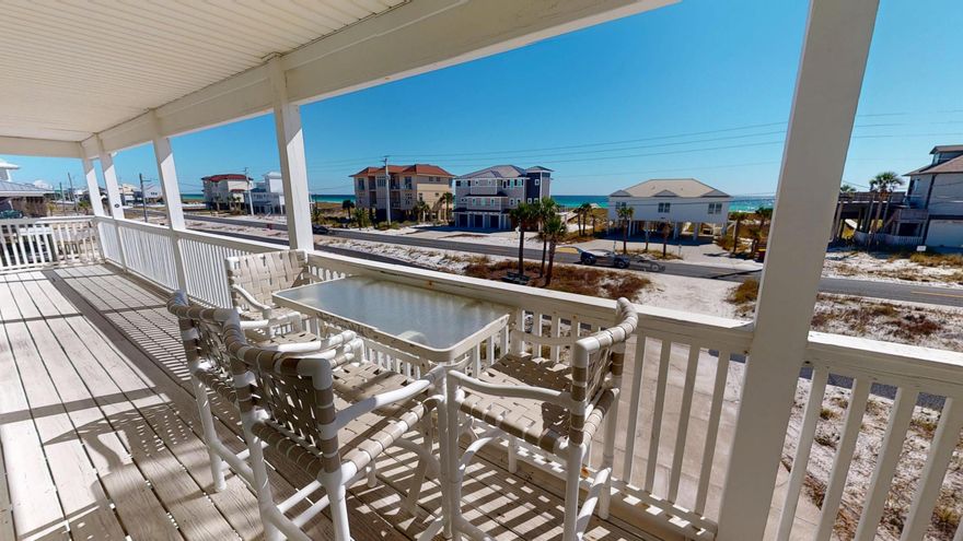 Back on the market and with a fresh makeover! This Navarre Beach home offers not only stunning Gulf views but also the chance to assume an incredible VA loan with a 2.375% interest rate (available to qualified buyers for a primary residence). Enjoy island living with no HOA, direct beach access, and the potential for significant monthly savings compared to today's rates.Located directly across the street from the Gulf, this unique home captures water views from nearly every room and two spacious decks that span the entire length of the house.The main living area is thoughtfully positioned on the second floor to maximize the breathtaking Gulf and Sound views. Bright and airy, the open layout features a large kitchen with Corian countertops, abundant cabinetry, brand new stainless steel appliances and a breakfast bar. From the dining area you'll find a spacious living room surrounded by windows and two sliding glass doors that lead to a covered Gulf-side balcony.  The perfect spot to enjoy your morning coffee or evening sunsets.

On the main floor, you will discover 3 bedrooms and 2 full bathrooms with cultured marble showers. All bedrooms feature a door leading to the Gulf-facing deck. The primary suite includes a walk-in closet and a private bath with a separate shower.

Other highlights include laundry on the main level, plenty of storage space, and a prime location just steps from the white sands and emerald waters of Navarre Beach.

Whether you're seeking a primary residence, second home, or vacation rental investment, this property delivers the best coastal living without an HOA's restrictions.  Freshly painted, new light fixtures, brand new appliances and fully furnished make this property move-in and rental ready!

Don't miss your chance to own a piece of paradise and an unbeatable 2.375% financing opportunity!
