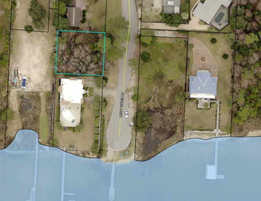 TIME TO BUILD!!0.21 acre wooded lot, Zoned SFR close to the water in Mary Esther! Electric, Phone, Public Sewer/Water, TV Cable are available on this street. Only 200′ from the boat launch into the sound.Wet Lands Mitigation, Environmental Protection and other documents are available upon request.