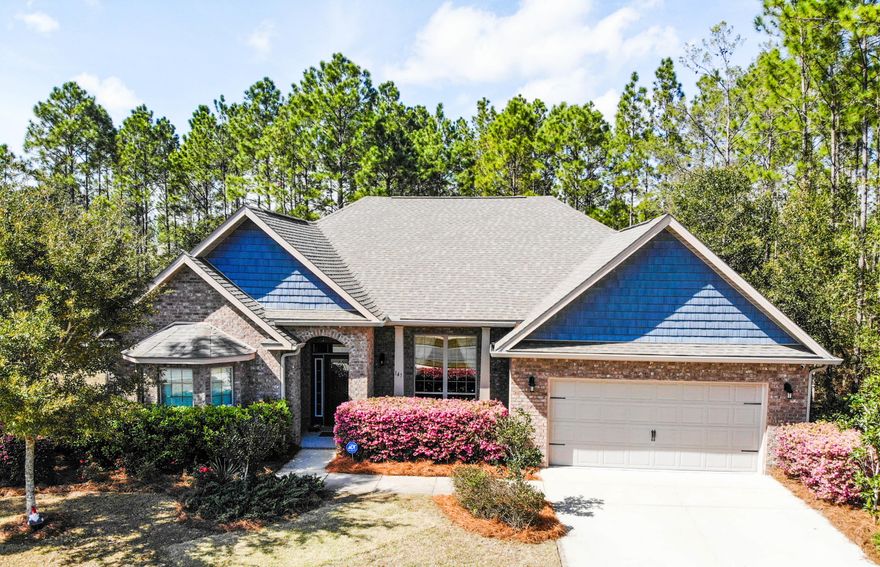 This well maintained all brick home, shows pride of ownership inside and out. The home is nestled on a large private lot which backs up to a Preserve area. The spacious open floor plan has 3 bedrooms, 2 bathrooms, separate office with bay window, and double doors for privacy. Entertain family and friends in the formal dining room, or keep it simple, serving guest seated at the Bar top of your eat-in kitchen. The Stainless kitchen features, beautiful granite counters, gas range and abundant cabinetry, ready for your culinary masterpieces. The Primary bedroom has room for, oversized furniture and sitting area, with access to the sunroom. Get ready for your day, at the master bath double vanity. Then unwind in the soaking tub. The main living space has, upgraded laminate and tile floor