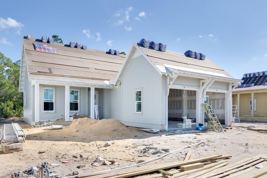 This expanded Bay Leaf plan from Huff Homes offers 2,120 square feet, 3 bedrooms, 3 bathrooms, and 2-car garage. Notable high end features include quartz countertops throughout, wood flooring throughout, lap and gap accents on all living room walls,Stacked glass cabinets with under cabinet lighting in kitchen, dry bar, Bosch appliances with vent hood and microwave drawer, 10' ceilings, crown molding throughout, cubbies in laundry, outside gas lantern and more!The Watersound Origins community is a wonderful neighborhood full of amenities including the Village Commons pool & fitness center, miles of nature trails, dock access to Lake Powell, unlimited golf and much more!