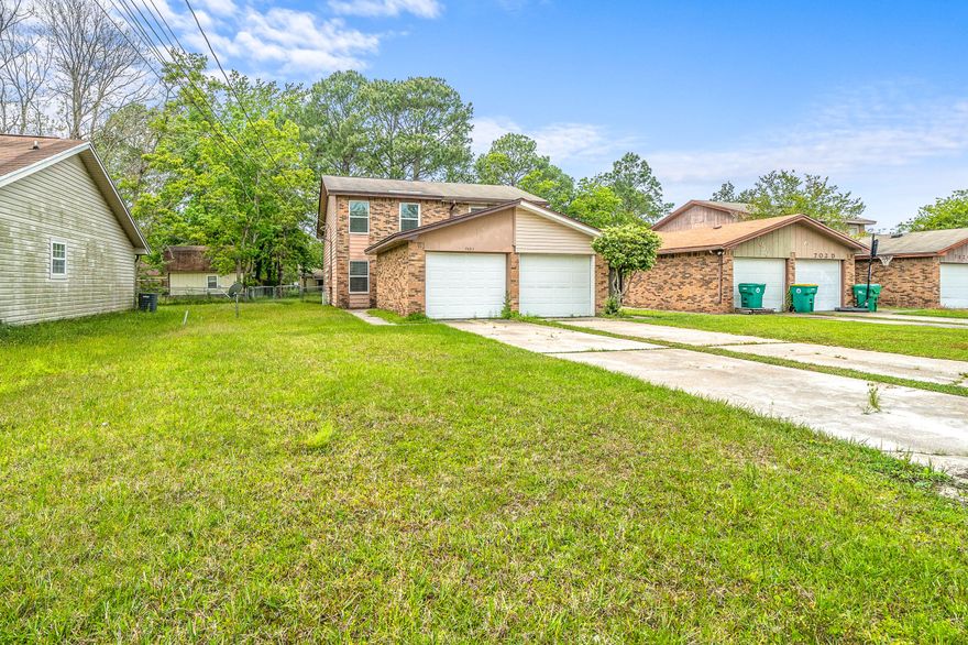 This 2/2 townhome has been fully updated and is a must see. Initially you are greeted by a large single car garage with plenty of room to park and store your extras. When you enter this home, you will immediately notice the open living room with gorgeous luxury vinyl plank flooring which continues into the kitchen. The kitchen features granite countertops, brand new white cabinets, and stainless steel appliances as well as a bathroom downstairs and indoor oversized laundry room. The large bedrooms are located upstairs and have brand new carpeting as well as a full bathroom also boasting the same upgraded finishes as the kitchen. Out back, you will find a nicely sized fenced backyard making entertaining a breeze.