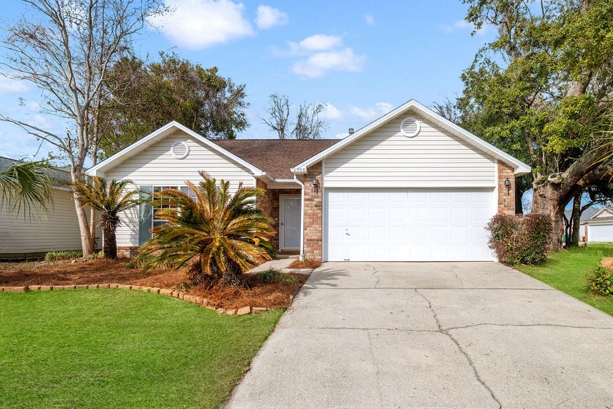 Welcome to 966 John Wayne Circle, a beautifully maintained home in a safe, family-friendly community that offers a modern feel and unbeatable convenience. Sitting on a spacious corner lot, this home has been freshly updated with a new coat of paint, a brand-new fence (2024), and a full professional pressure wash. For added peace of mind, the property is protected by an ADT alarm system, ensuring extra security for your loved ones and belongings. Located just 3 minutes from Walmart, Lowe's, and Sam's Club, this home makes daily errands effortless. Military personnel and their families will appreciate the short 5-minute drive to Hurlburt Field Air Force Base and 13 minutes to Eglin Air Force Base. If you love the outdoors, the equestrian center just two streets away is perfect for after-school activities and weekend adventures. Best of all, you're only 15 minutes from the beautiful blue waters and white sand beaches of the Gulf Coast, making this an incredible opportunity to live near some of Florida's most breathtaking coastline.

Inside, you'll find spacious bedrooms that provide plenty of room for relaxation and comfort, making this home perfect for families, guests, or even a home office setup. Designed for efficiency and longevity, this home features a 2019 roof, a 2015 HVAC system, a 2015 water heater, and natural gasoffering energy savings and reliable performance for years to come. The spacious two-car garage provides ample storage and convenience, making daily life even more functional and organized.

With a prime location, modern feel, unbeatable convenience, security, and easy access to the beach, this is the perfect place to call home. Don't miss out on this amazing Gulf Coast living opportunity, schedule your showing today!

