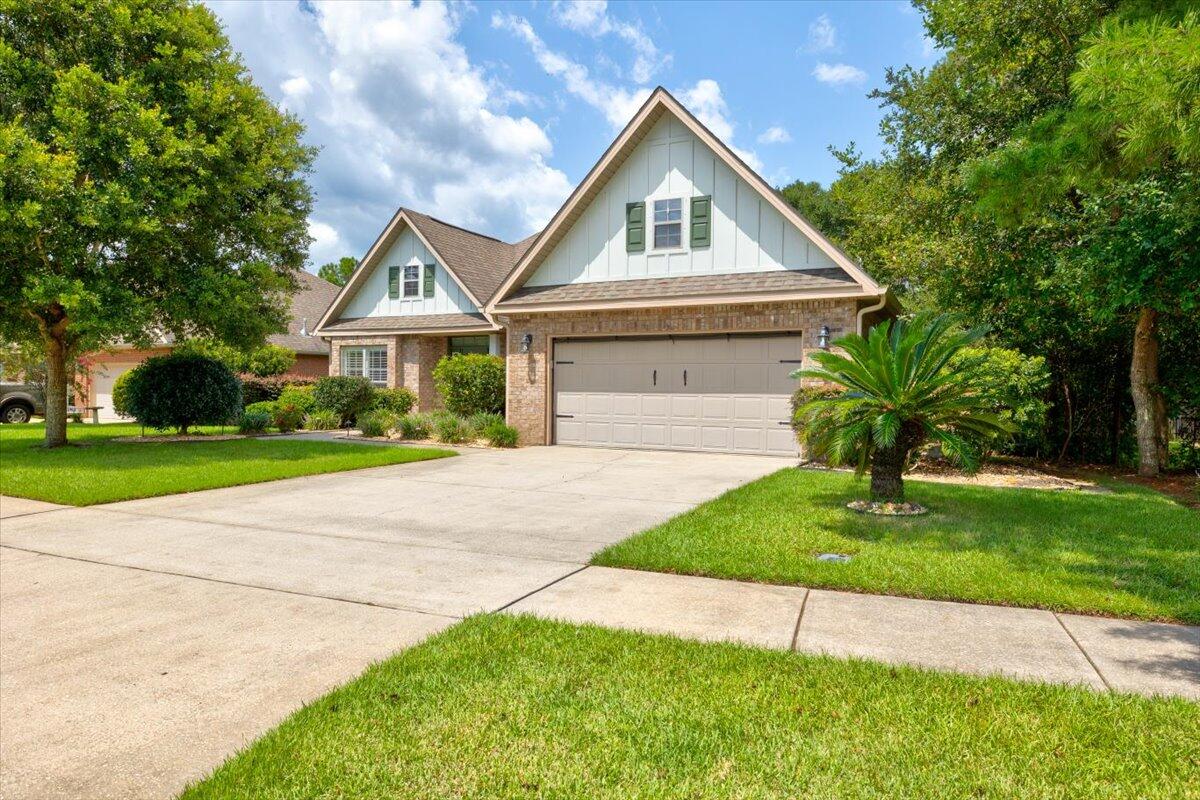 Welcome Home to Orchard of Hammock Bay! This 2,182 sqft 3 bed/2 bath home sits on over 1/3 of an acre & backs to a nature preserve! The split floor plan includes a bonus room (that could be converted to a 4th bedroom) & a dining room as well! The openness of the floor plan is perfect for entertaining. The kitchen includes a center island, peninsula for extra seating, under-cabinet lighting, pull out shelves in cabinets, gas range, stainless appliances, pantry, and in-kitchen dining. The master bath is exquisitely & newly remodeled, you'll have to see for yourself! A list of $50,000 in updates is attached, some include Luxury Vinyl Plank flooring throughout, plantation shutters, screened in deck, HOT TUB, a $10,000 Generac Whole Home Generator, storage Shed, gazebo, aluminum fencing, & more