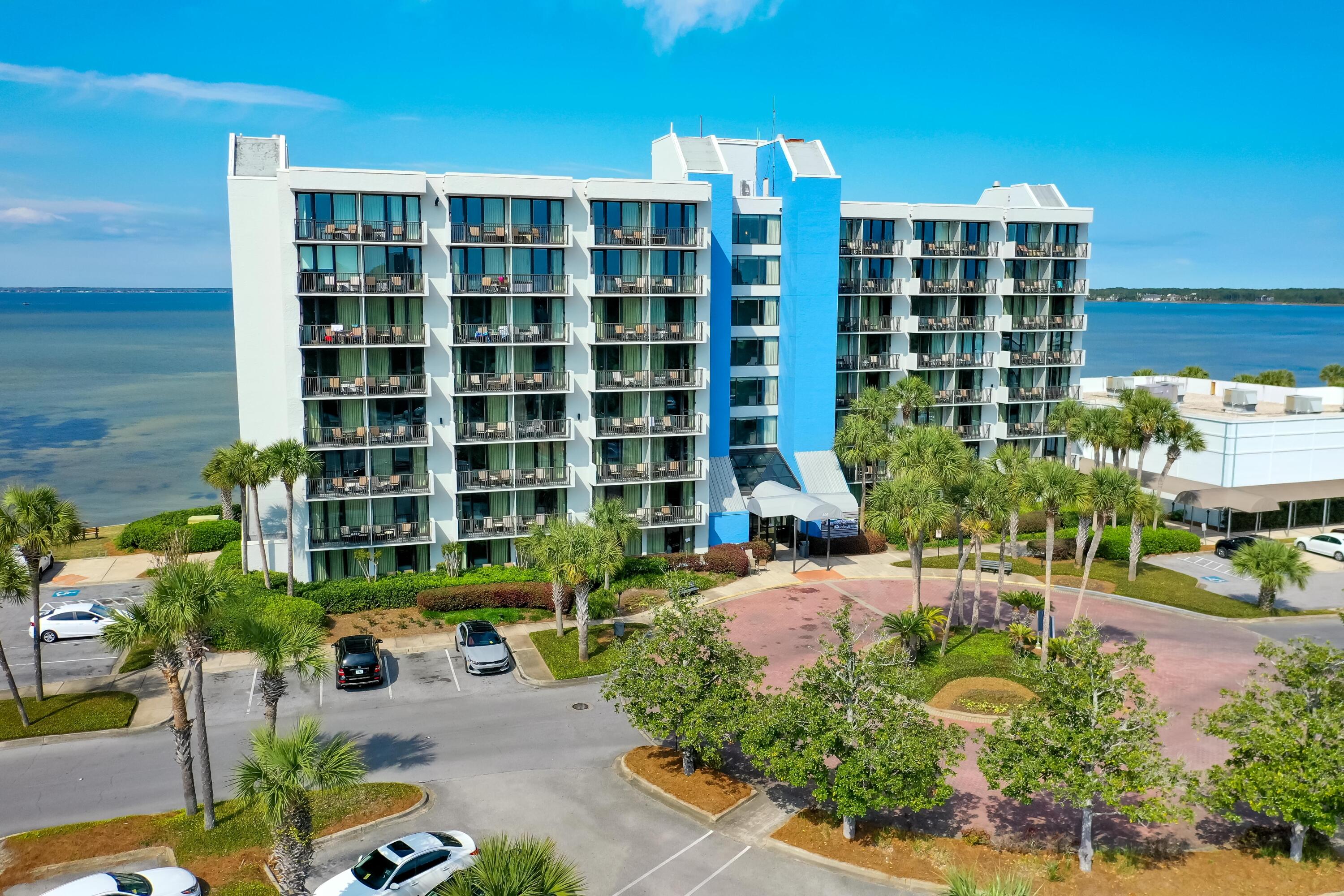 Photos Coming: Discover your oasis in this beautifully updated ground-floor studio at Bayside at Sandestin.  Imagine waking up to breathtaking bay views and stepping right outside onto your private patio - a true walkout experience that brings the outdoors in.  This isn't just a condo; it's a lifestyle upgrade. Inside, you'll find a stylish, comfortable space featuring elegant tile flooring, sleek granite countertops, and a generously sized walk-in shower.  The fully furnished studio is designed for effortless living, complete with a king-sized bed, a cozy sitting area, and a convenient kitchenette equipped with everything you need for quick meals and snacks.  Think mini-fridge, microwave, and toaster oven - perfect for weekend getaways or extended stays. Beyond your doorstep lies the vibrant Sandestin Golf and Beach Resort.  Enjoy easy access to the Links Golf Course, the Linkside Conference Center, and the Sandestin Fitness Center.  The onsite tram whisks you away to the sugar-white sands of our pristine beaches and the lively Village of Baytowne Wharf, where dining, shopping, and entertainment abound.

One of the best parts?  Your association fees cover all utilities, simplifying your budget and giving you one less thing to worry about.  Just secure your contents insurance, and you're set.

As a special welcome to Sandestin, new owners receive two 90-minute rounds of tennis, a golf foursome at one of our three championship courses, and a round of golf for up to four players at the exclusive Burnt Pine Golf Club.

Sandestin itself offers over seven miles of beaches and bay frontage, four championship golf courses, 15 world-class tennis courts, a 226-slip marina, a state-of-the-art fitness center, a luxurious spa, and celebrity chef dining.  Explore the charming Village of Baytowne Wharf, where you can shop, dine, and play to your heart's content.  Within our gates, a balanced lifestyle awaits, spread across 2,400 acres from the beach to the bay.  Navigate the resort effortlessly by golf cart or bicycle along miles of scenic paths that wind through lush landscapes, past lagoons and fountains, and alongside meticulously manicured fairways.  Bayside at Sandestin is a pet-free community (service animals as defined by the ADA are permitted).  This is more than just a property; it's an invitation to experience the Sandestin difference.  Contact us today to schedule your private showing.