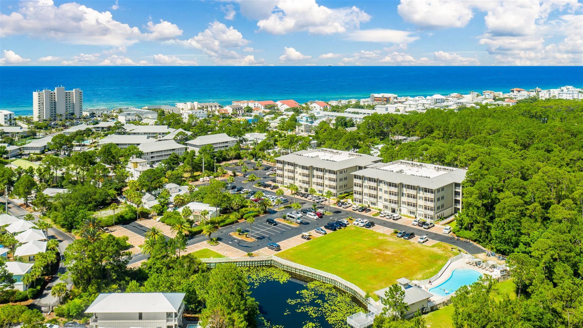 A lovely condo in the heart of 30A. Take advantage of the great location with a very short walk to the public beach access, as well as dining. This lakeside community boasts plenty of green space and a community pool. The unit has a very functional layout with a comfortable flow. The screened-in balcony overlooks a wooded lot and is the perfect quiet spot for a morning coffee or afternoon cocktail. A brand new HVAC was installed in February 2023. This would make for a fantastic rental, accommodating up to 8 guests, or primary residence alike.