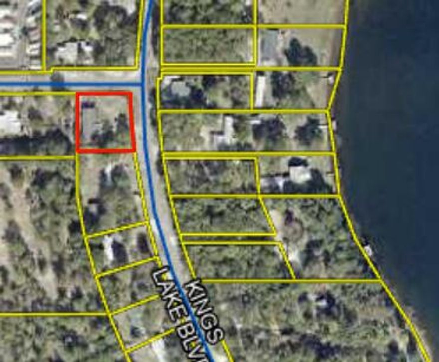 Spacious 3-bedroom, 2-bath mobile home offering 2,280 sq ft of potential on a fenced 0.40-acre corner lot with a waterview of Kings Lake. Featuring a large great room, existing utilities, and plenty of room to reimagine or rebuild. The home needs significant repairs and may be best suited for renovation or replacement--perfect for investors or buyers seeking a project in a desirable area just outside of town. Cash or owner financing terms available--bring your vision and make this property shine!