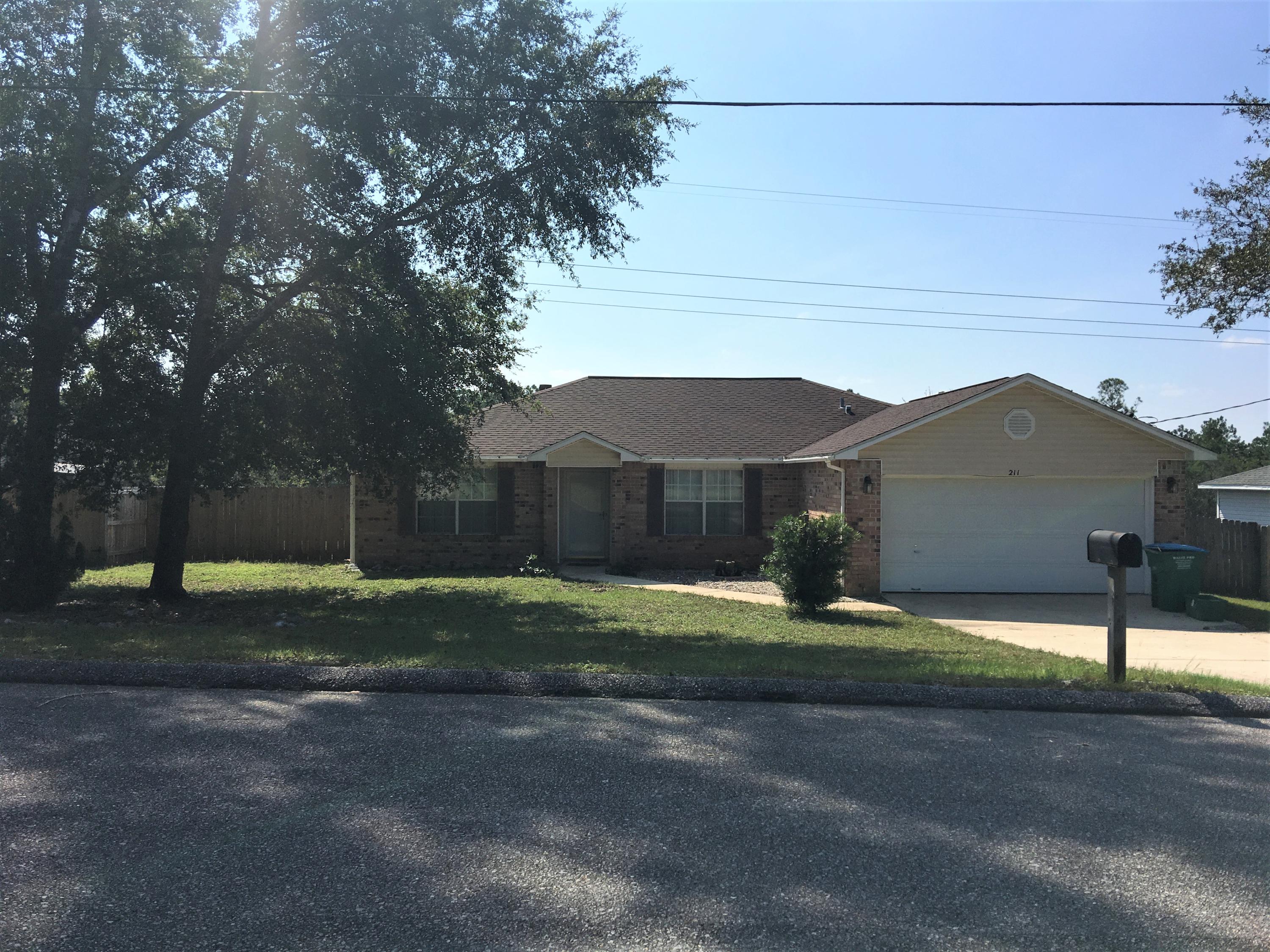 This 4 bed 2 bath home in South Crestview is move in ready. This home is located in a great neighborhood on a level lot. You are going to love the vaulted ceiling, fresh paint and new flooring. This is a split floor plan with large rooms and a huge walk in master closet. This kitchen offers so much counter and cabinet space along with a center island. The 2 car garage has a sealed floor. The HVAC is new. Additional living, dining, or entertaining space can be found in the Florida room. Call today to view this beautiful home.