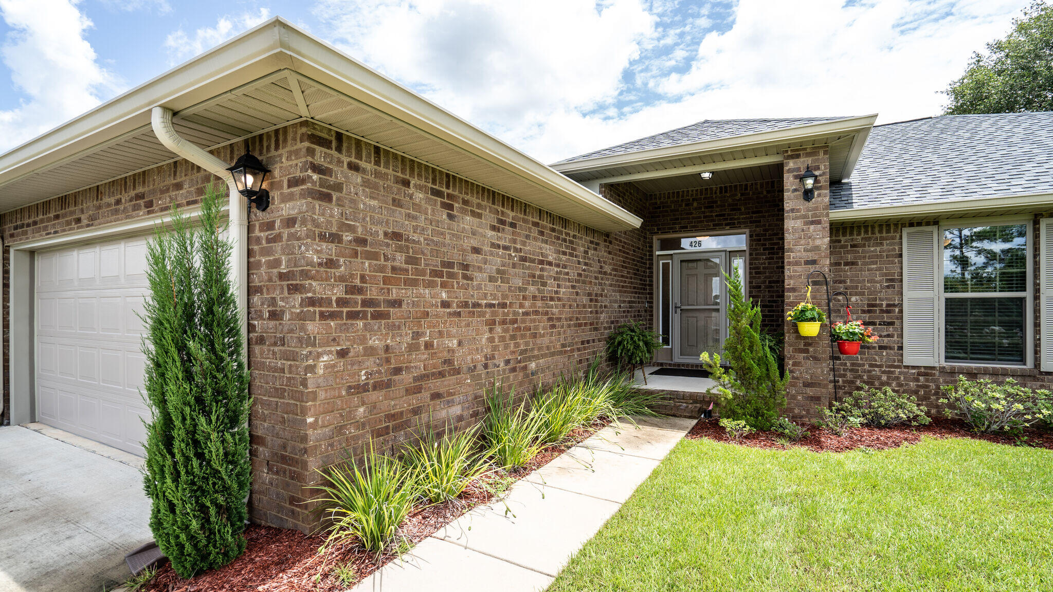 Fantastic brick front home located in the heart of Old Bethel Estates.  Grand bricked columns and a large front porch welcome you to this outstanding 4 bed/2 bath split floor plan home.  The home was built in 2019 and has had one owner who has kept the home looking brand new!!!