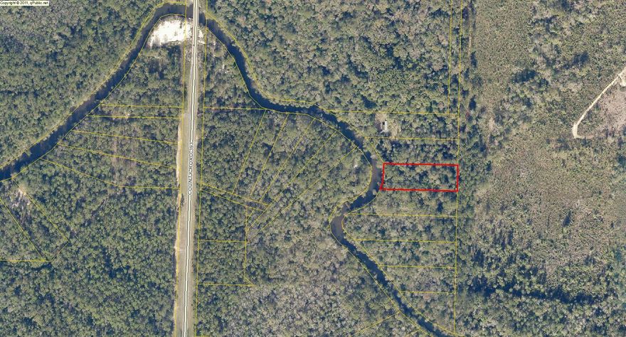 1.25 Acres on Shoal River! Build your dream home or a quiet getaway! Physical Access to property but no Legal Access at this time. Buyer to verify all information deemed important.North on Hwy 393. Follow for 3 miles. Access will be on Right at 5801 Hwy 393. Call listing Agent before showing!Effective Flood Zone A