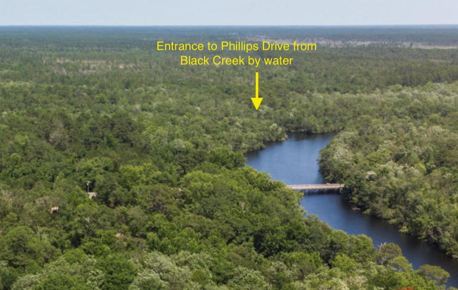 Looking for peace and quiet? Wooded 4 Acres with 300 feet water front on Black Creek! You won't find property like this in Freeport area and at this price. This creek allows you to get to Choctawhatchee Bay by boat in minutes. Get away from the beach crowd and enjoy your own piece of nature. Enough to build home, family compound, dock your boat, own a horse. No HOA. Portion of property is in X flood zone.