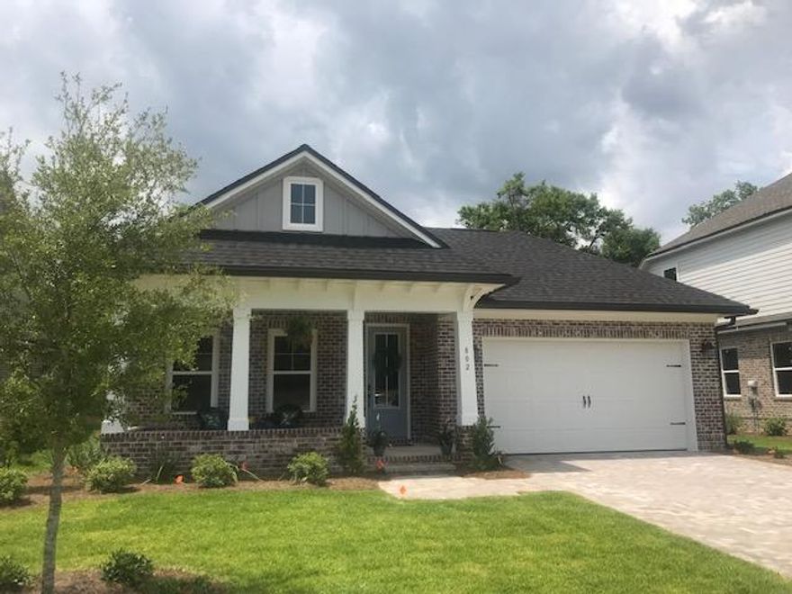 Locally renowned builder offers Model floor plan in exclusive Osprey Ridge community. Short distance to public boat ramp and Niceville Yacht club. Ruckel Middle School and Niceville High School just up the road!! Location, Location, Location!! Pavestone driveways, lush landscape, screened back porch and nice size backyard. Interior home features granite countertops, built in stainless appliances, extensive crown moulding, cased windows, top of the line cabinetry. Home also features smart security system, tankless gas hot water heater and coated garage floors