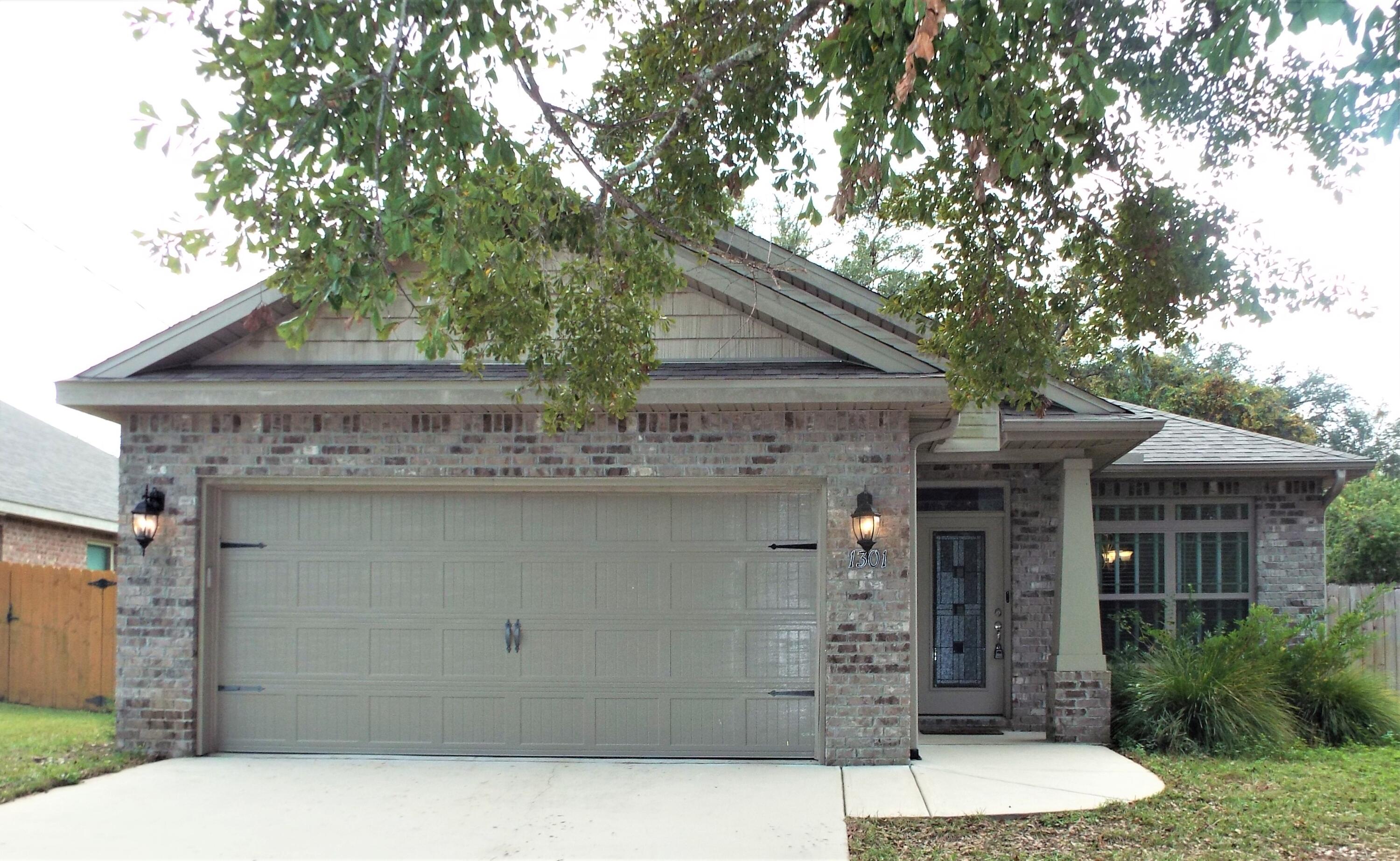 WELCOME HOME to this beautiful and like NEW meticulously maintained 4 bedroom home in the heart of Niceville! The home features 9 & 10 ft ceilings that gives this home a sense of grandeur! The spacious kitchen has granite countertops with tons of useable countertop space as well as a breakfast bar with room for 5 or 6 barstools! Stainless steel appliances including a new oven/range compliment the color scheme beautifully and the huge pantry offers more than enough space for all your goodies!! The front room of the house could be used as a formal dining room although it feels more like an extension of the kitchen due to it's extra wide entryway from the kitchen! The great room is bright, spacious and open to the kitchen..truly the heart of the home! The master bedroom is large and