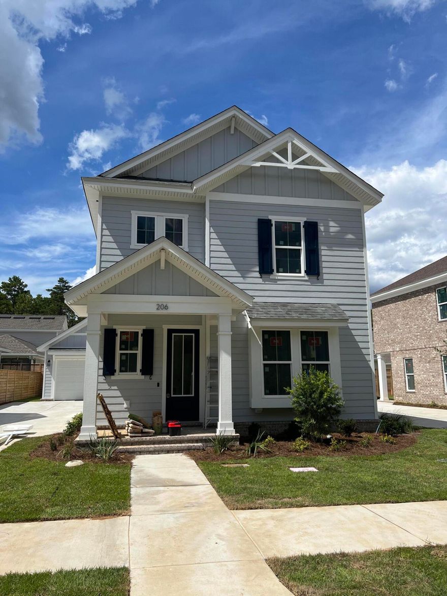 Deer Moss Creek, Brookfield, is a strategically planned community with each home built perfectly to suit each lot. This Florida Craftsman style home, the Chestnut, has 4 bedrooms, 2 1/2 baths with the primary bedroom located on the main floor and three additional bedrooms upstairs. A welcoming foyer greets you and leads you to a spacious living room and a lovely kitchen and cafe dining area. Kitchen boasts soft close drawers, stainless appliances incl. refrigerator, apron sink, quartz counters and a pantry. This home has over $10,000 in added features including herringbone brick on rear porch, soffit outlets, touchless, keyless entry doorknob, smart thermostat, custom subway tile behind range, port filler, rain shower head, smart feature toilets and all LVP floors! July 1 completion!