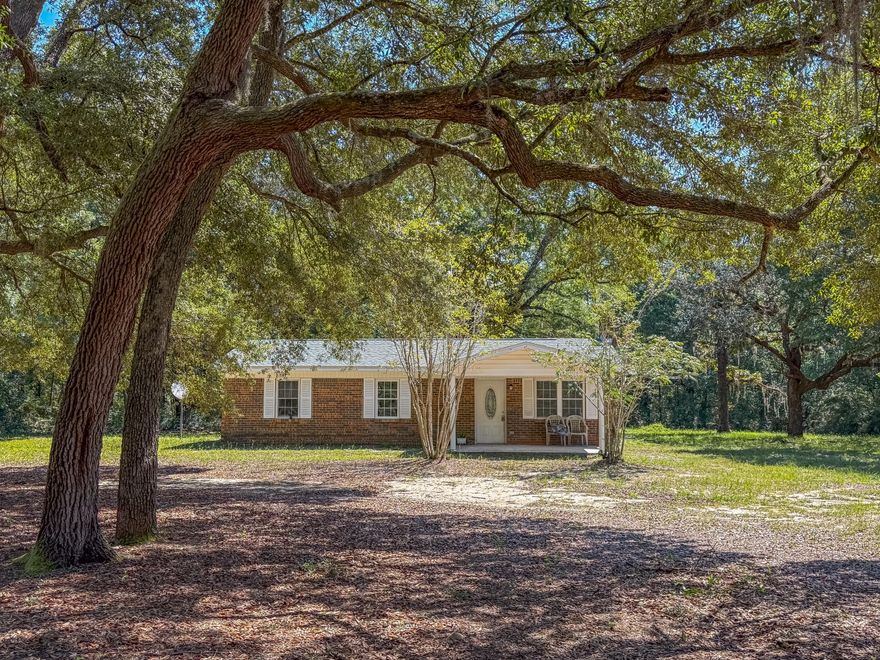 Professional photos coming soon! This 4BR/2BA home will sit on approximately 2 acres and has had all the major updates completed, including a newer roof, HVAC, flooring, electrical, and septic. The roof was replaced in March and the HVAC and electrical wiring in July! The home features a split floor plan, fireplace and a versatile bonus room that can be used as an office, dining area, or flex space. Mature oak trees and azaleas adorn the property giving it that country Florida vibe. There's plenty of room for your horses, chickens, or garden! Located on Old River Road, the property offers the peace and quiet of country living while remaining convenient to Crestview. The landscaping is a blank canvas, and ready for your personal touch. Contact me today to schedule a private showing!