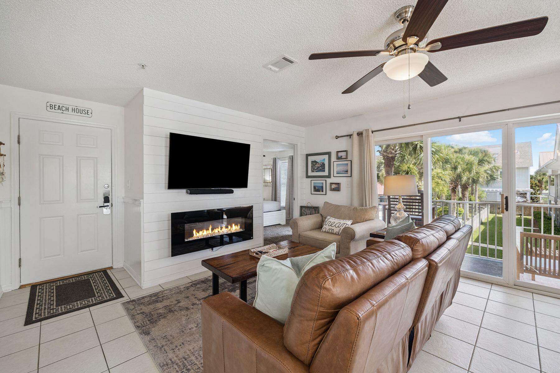 Tucked into a serene pocket of Seagrove Beach, this updated three-bedroom corner condo offers a relaxed pace and easy access to the best of 30A. Located in the low-density community of Rollin Tide Villas, Unit B4 boasts a rare combination of privacy, proximity, and charm.Bright and beachy interiors include a shiplap-accented living room with an electric fireplace, cozy breakfast nook, and remodeled bathrooms throughout. The open layout spills out onto a large private balcony--accessible from both the main living space and the primary suite--perfect for morning coffee or a sunset drink. With two queen bedrooms and a third bedroom featuring two full beds and a bunk, the home comfortably accommodates nine guests. Beyond the unit, Rollin Tide Villas delivers one of Seagrove's most generous pools, heated in the spring and surrounded by palms and tropical landscaping. With beach access just 350 yards away and a prime central location, you'll find everything from fine dining at Caf?? Thirty-A to pizza at Angelina's within walking distance, and Seaside, Florida, just a short bike ride away.
Ideal for peaceful getaways or lively family gatherings, this inviting retreat pairs comfort with convenience in one of the most walkable corners of Seagrove.