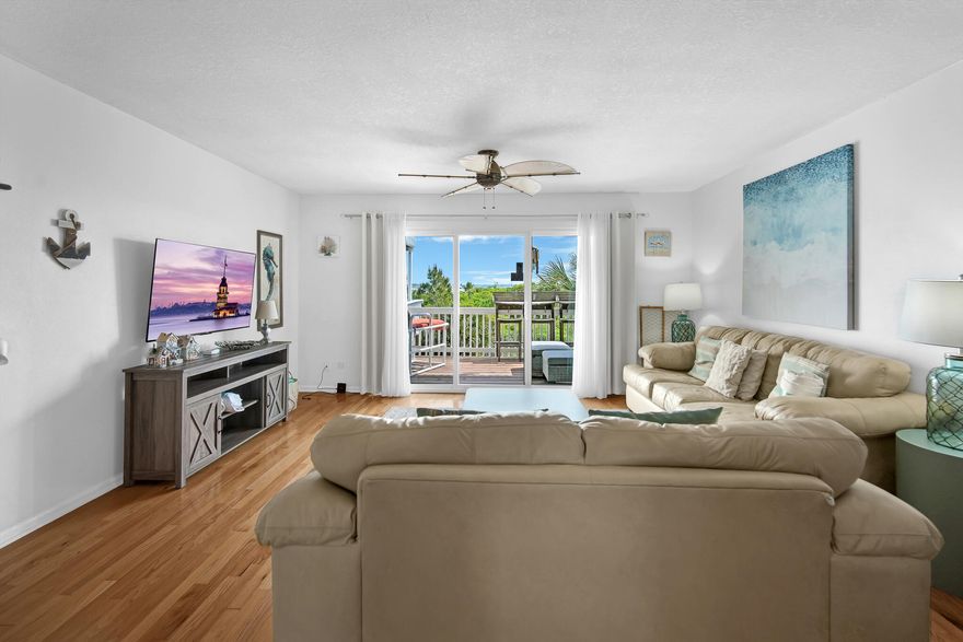 Water Views from Every Room | Low HOA | Short-Term Rentals Allowed-Experience the ultimate coastal lifestyle with this beautifully maintained townhome nestled perfectly between Navarre Beach and Santa Rosa Sound. Enjoy breathtaking water views from every room, with three private balconies offering front-row seats to vibrant sunrises and playful dolphins in the distance.Boasting a 2024 roof, newer HVAC and water heater, this home is truly move-in ready and low-maintenance. The spacious, sunlit two-story layout features an open-concept main floor perfect for entertaining, and a covered lower-level deck with BBQ grill--an ideal setup for family gatherings or relaxing after a day on the water.Upstairs, you'll find two private bedrooms separated from the main living space- ensuring peace and quiet. The kitchen includes a breakfast bar, coffee nook, and updated backsplash, seamlessly flowing into the living area and out onto a second-floor balcony.
Take a short stroll to the private neighborhood dock for fishing, paddleboarding, or a refreshing dip. The heated community poolreserved for residents onlyis just steps away. Access Navarre Beach and local favorites like Juana's Pagodas easily by golf cart for dining, live music, and family fun.
With a low HOA that maintains the grounds year-round and allows short-term rentals, this property offers both lifestyle and investment potential. Whether you're seeking a primary residence, vacation retreat, or income-producing rental, this townhome delivers.

