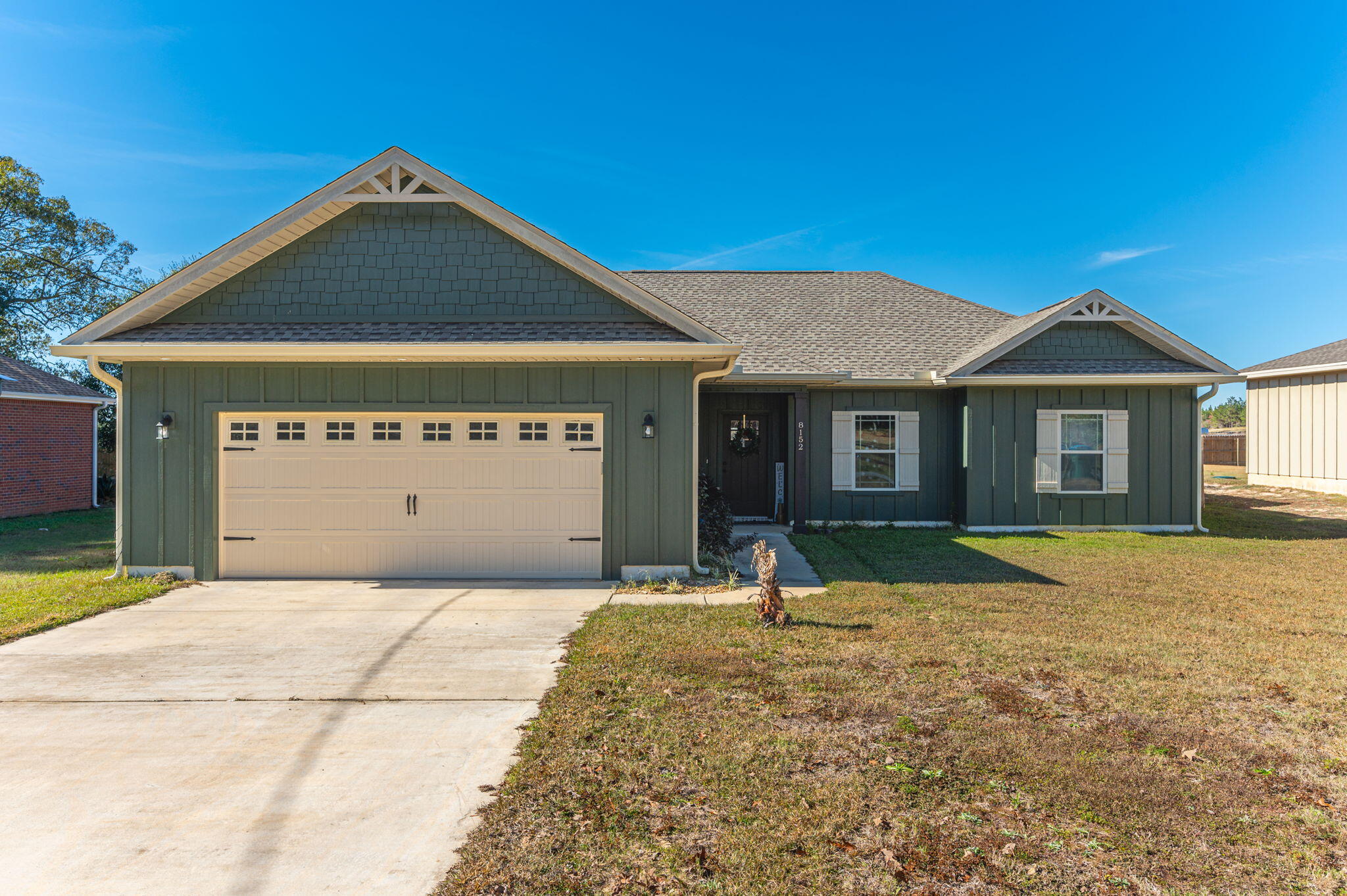 Welcome to this charming 3-bedroom, 2-bath home nestled in the quaint town of Laurel Hill, FL. Boasting curb appeal with durable hardy board siding & seamless gutters, this home offers both style and functionality. The fully finished 2-car garage is a standout feature, complete with painted floors, sheetrock, wood trim, and an automatic garage door opener. Access to the attic is conveniently located in the garage for extra storage.Inside, you'll find beautiful wood-look tile throughout the main living areas and bathrooms, while plush carpet warms the bedrooms. The spacious kitchen features custom cabinetry, stunning granite countertops, and stainless steel appliances--perfect for culinary enthusiasts.The master suite is a true retreat, with a custom tile shower, high pressure rain showerhead, and a double vanity with granite countertops. Enjoy the walk-in closet and the added privacy of a separate commode area.
The guest bathroom, conveniently located between the two guest bedrooms, features a tub/shower combo.
Step outside to the fully fenced backyard with a privacy fence, ideal for relaxing or entertaining on the large, covered patio. This home has city water & a septic tank, along with a lift station.
Don't miss out on this move-in-ready gem in Laurel Hill! This home has many upgraded features.
