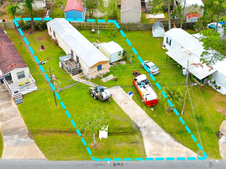 Location! This property is in the primary area, its a 5 minute walk to Bayside Marina, and about a 15 minute drive to Panama Cities pristine beaches! Great investment opportunity, bring your dumpster!