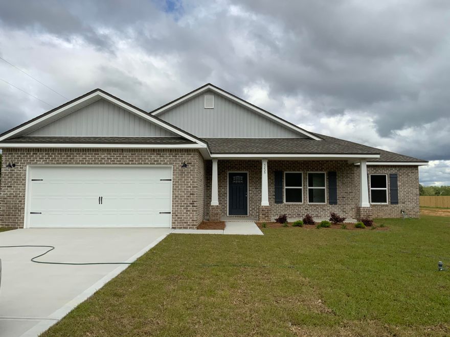 OVER 1 ACRE - BAKER LOCATION - NEW ALL BRICK CONSTRUCTION- Front porch leads you inside to beautiful foyer looking into open living/kitchen/dining area.  Raised ceilings and recessed lighting throughout with ceiling fans in bedrooms and living area.  Kitchen has work island with bar seating, pantry, quartz or granite countertops, white shaker cabinets, stainless steel appliances.  Mudroom PLUS separate LAUNDRY room!  Additional bathroom has double vanities + linen storage.  Owners suite off the kitchen, bath features double vanities, oversized shower, linen storage and large walk-in closet.  Covered rear porch for relaxing in the evening.  Photos are of similar completed home-COLORS AND FRONT ELEVATION may vary, LATE MARCH/EARLY APRIL completion.