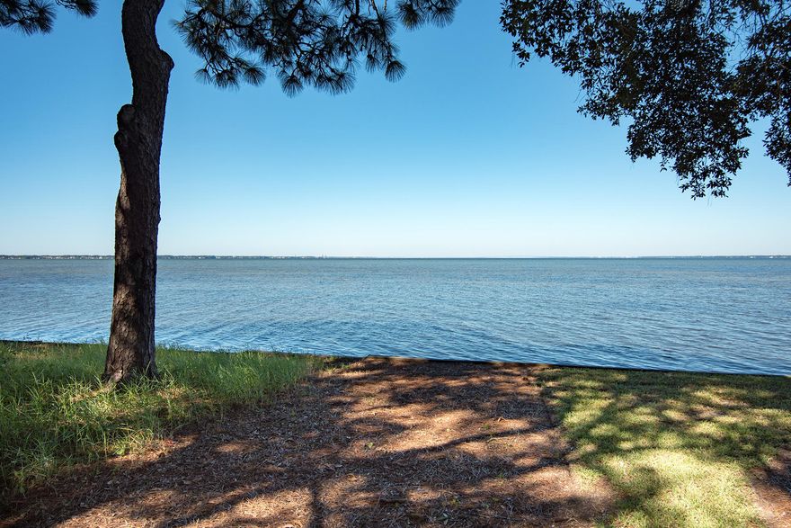 The last remaining vacant lot on Bay Villas Drive, this waterfront site with approximately 70 feet of frontage on Choctawhatchee Bay provides well over a 1/4 acre on which to build your custom home within the private, gated confines of Burnt Pine at Sandestin Golf and Beach Resort. Enjoy breathtaking sunsets over the bay during the spring and summer months as well as immediate access to fishing. There is no build out time requirement in Burnt Pine so lot owners may build at their leisure while taking advantage of membership eligibility in the Burnt Pine Golf Club and other Clubs Sandestin offers. Designed by course architect Rees Jones, the back nine of the 7,000-yard Burnt Pine Golf Club are highlighted by views of the bay, while its front side introduces golfers to