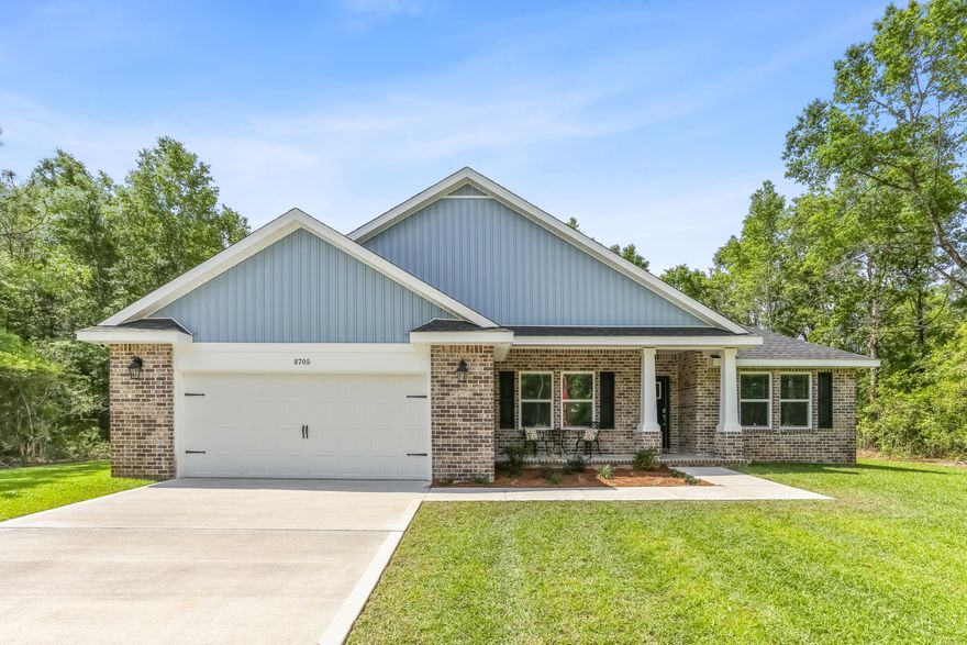 Welcome to Doyle Hawkins Landing, Your dream home is here! The Sapphire Floor Plan is a stunning 4-bedroom, 2-bath home designed for both comfort and sophistication. Featuring an open layout with high ceilings, this home offers a bright and airy living space perfect for entertaining and everyday life.  At the heart of the home is a beautifully designed kitchen, complete with sleek stainless steel appliances, granite or quartz countertops, slow-close cabinets and drawers, ample cabinetry, and a convenient separate pantry. The open-concept design flows effortlessly into the living area, while a separate dining room provides flexibility as a formal space or a home office.The split floor plan ensures privacy, with the master suite tucked away for a  serene retreat. The spacious master bedroom showcases elegant trey ceilings and abundant natural light. The luxurious en-suite bathroom includes a double vanity, a private water closet, a stand-up tiled shower with dual shower heads, a garden tub, and two large walk-in closets. 
Doyle Hawkins Landing is a quiet, tree-lined enclave featuring just 8 new-construction homes located at the corner of Doyle Hawkins Road and Bob Tolbert Road in Navarre, Florida. Conveniently located minutes from Navarre Beach, local schools, dining, and military bases, Doyle Hawkins Landing offers the perfect balance of privacy and accessibility. 
Pictures are of a similar home, colors may vary.
Home will be completed in February of 2026.
