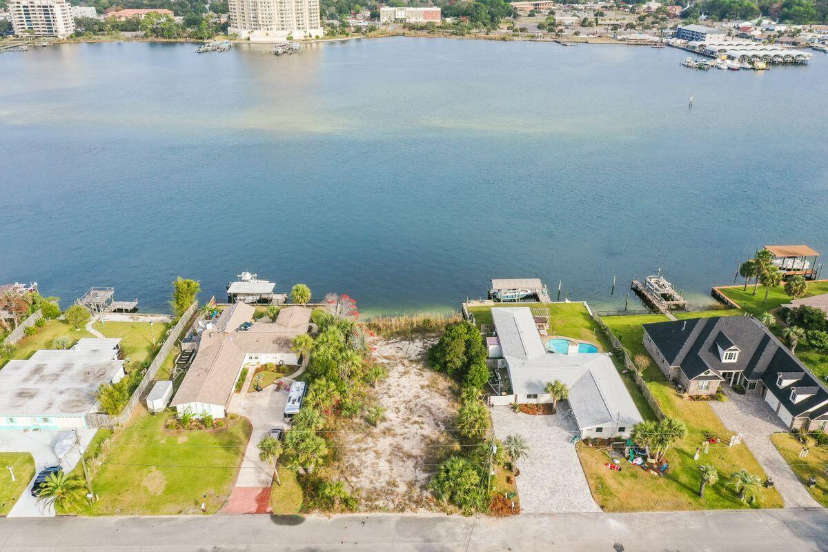 LARGE DEEP WATER LOT with gorgeous views on Okaloosa Island. Enjoy 80 Feet of waterfront property overlooking the Intracoastal Waterway with a sea wall already in place! The majority of this lot lies in Flood Zone X and you are only 800 feet away from the public beach access....this is the perfect location to build your primary residence or dream vacation home!