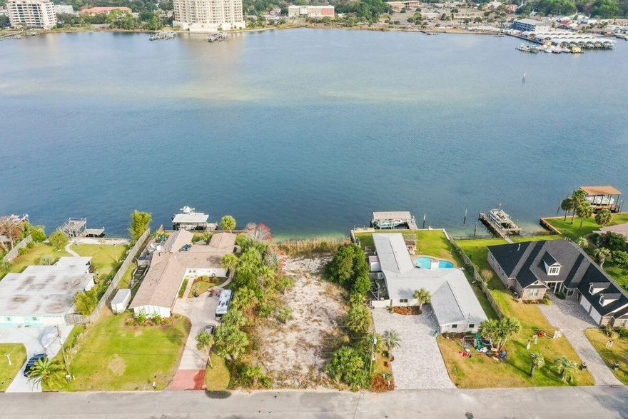 LARGE DEEP WATER LOT with gorgeous views on Okaloosa Island.  Enjoy 80 Feet of waterfront property overlooking the Intracoastal Waterway with a sea wall already in place!  The majority of this lot lies in Flood Zone X and you are only 800 feet away from the public beach access....this is the perfect location to build your primary residence or dream vacation home!