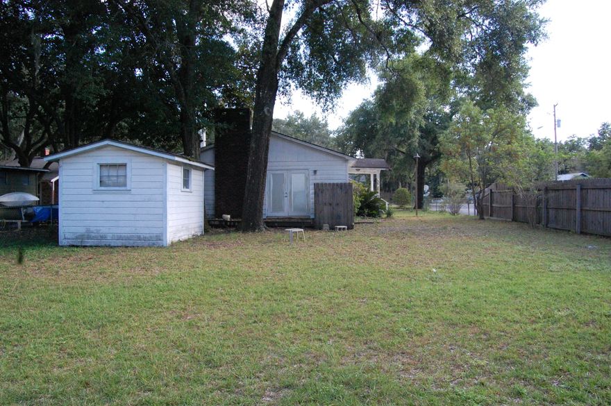 Great Opportunity located in the heart of Niceville! Spacious 3BD/2BA home located within close proximity to area bases and schools. The fully-fenced property contains a yard building and two-car garage with living quarters above including a full bath. The home has been partially renovated through the kitchen and dining room. The property is spacious and has a lot of potential.