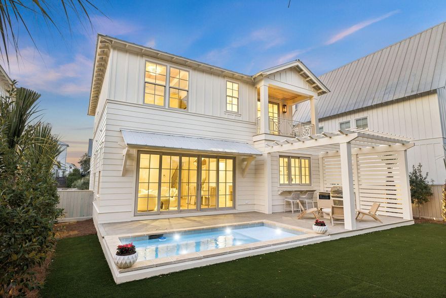 Positioned in the sought-after Preserve at Inlet Beach neighborhood, this newly constructed home by Focus Construction offers 4 bedrooms and 3 bathrooms just minutes from 30A and the Gulf. Built with quality craftsmanship and attention to detail, the home features a functional layout with a first-floor bedroom and three additional bedrooms upstairs, including a spacious primary suite with a vaulted ceiling, private balcony, and views overlooking the pool.The main living area is designed for both everyday living and entertaining, with 10-foot ceilings, European white oak hardwood floors, and expansive sliding glass doors that open seamlessly to the private pool deck. The kitchen is outfitted with Thermador appliances, custom cabinetry, a large center island, and a walk-in pantry, along with champagne plumbing fixtures and accent hardware. A pass-through window connects the kitchen directly to the outdoor kitchen and poolside entertaining area, creating a true indoor-outdoor living experience.

Outdoor living is a standout, featuring a heated private pool, fenced backyard, artificial turf recreation space, and lush landscaping enhanced by lighting and drip irrigation. A paver driveway and gas lanterns add to the home's curb appeal.

Upstairs, the primary suite offers a private retreat with a balcony overlooking the pool, a well-appointed bathroom, and a spacious walk-in closet. Interior details such as cypress accent ceilings, solid core doors, and custom fabricated handrails highlight the level of finish throughout.

Additional features include built-in bunk beds, a one-car garage equipped with an electric vehicle charger, a gas tankless water heater, and the home is prewired for speakers and security.

Residents of The Preserve at Inlet Beach enjoy private lake access to Lake Powell, a community pool, and a shared dock. With the pedestrian underpass providing easy access to 30A, the Gulf, and nearby dining and shopping at 30Avenue including Amigos, Amici's, Cuvee, Idyll Hounds Proper, and Aja Elevated Asian, this location offers both convenience and lifestyle.

A rare opportunity to own a well-built, thoughtfully designed home in one of Inlet Beach's most desirable communities, just minutes from Rosemary Beach and Alys Beach.