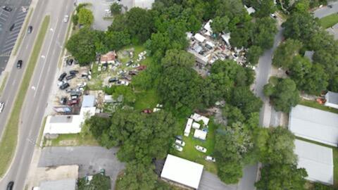 Sale includes 4 lots total. approx 1.73 acres total, 112 Racetrack .78 acres Frontage 112 depth 350 zoned service shops, with one concrete building 1756 sqft heated, 2074 total built in 1960. Parcel 36-1S-24-0650-0004-0070 / .36 acres for Racetrack Rd zoned commercial vacant Frontage 56 depth 320, Parcel 01-2S-24-2470-0005-0010 / .39 acres for 912 Barrow street, frontage 185. Parcel 01-2S-24-2470-0005-0040 / .019 acres for Barrow street Frontage 40 Zoned commercial vacant. Last largest remaining duel frontage buildable lots on Racetrack. Many opportunities for buyer to consider. The property is currently rented out to numerous companies, all on a month to month lease. Buyer can continue leasing out to current tenants, or end lease and build to suit needs.