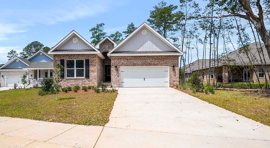 Limited Homesites Remaining! New construction at Live Oak Harbor located in Freeport, Florida. This beautiful new community features heavily wooded lots, Less than half a mile to the Freeport Marina and on LaGrange Bayou. This community is perfect for anyone who wants to enjoy the benefits of living by the water with the feel of a private neighborhood. The 'Kennedy' plan features a spacious back porch, Hardie siding, 9' ceilings, EVP flooring, Ivory shaker style cabinetry in the kitchen and bathrooms, quartz countertops, and a modern tile shower.  This energy efficient home offers 'Home is Connected' Smart Home package, DEAKO switches, 1-year builder warranty and 10-year structural warranty.