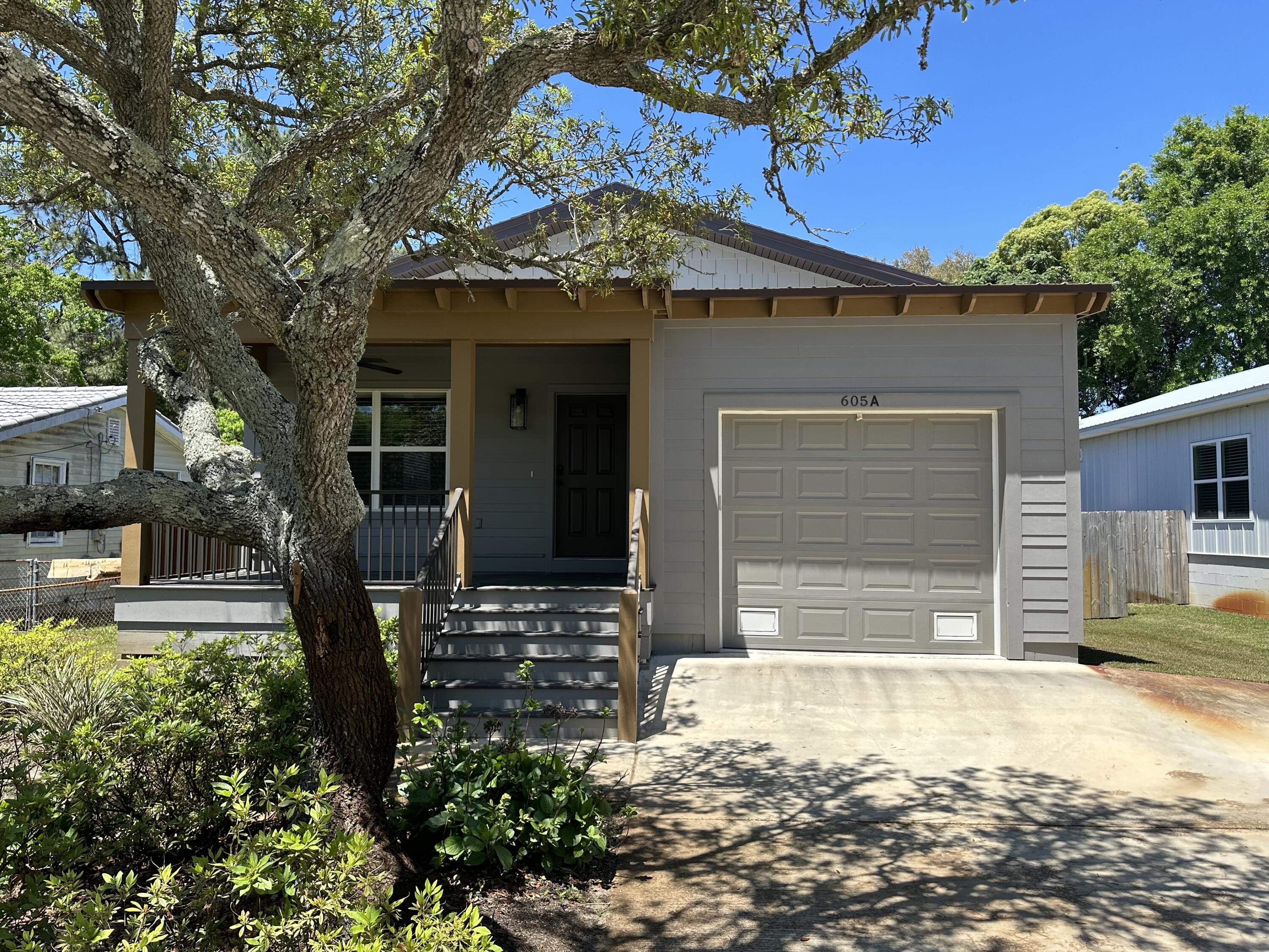 Rare like new 4 bedroom 3 bath home in Old Destin, Maintenance free aluminum and Hardy Board siding with a metal roof. Built in 2022 home boasts Vinyl flooring through out as well as Granite counter tops in the Kitchen and all three bathrooms and tankless water heater..Master bedroom has two walk in closets and double sinks. There is a stand alone utility closet for washer and dryer in the hallway with a custom barn door.The fenced back yard includes a covered patio and dedicated grilling area with natural gas.Custom built storage areas in the garage as well. Two covered porches, 2X6 interior framing, LVP floors and Marble shower pans.