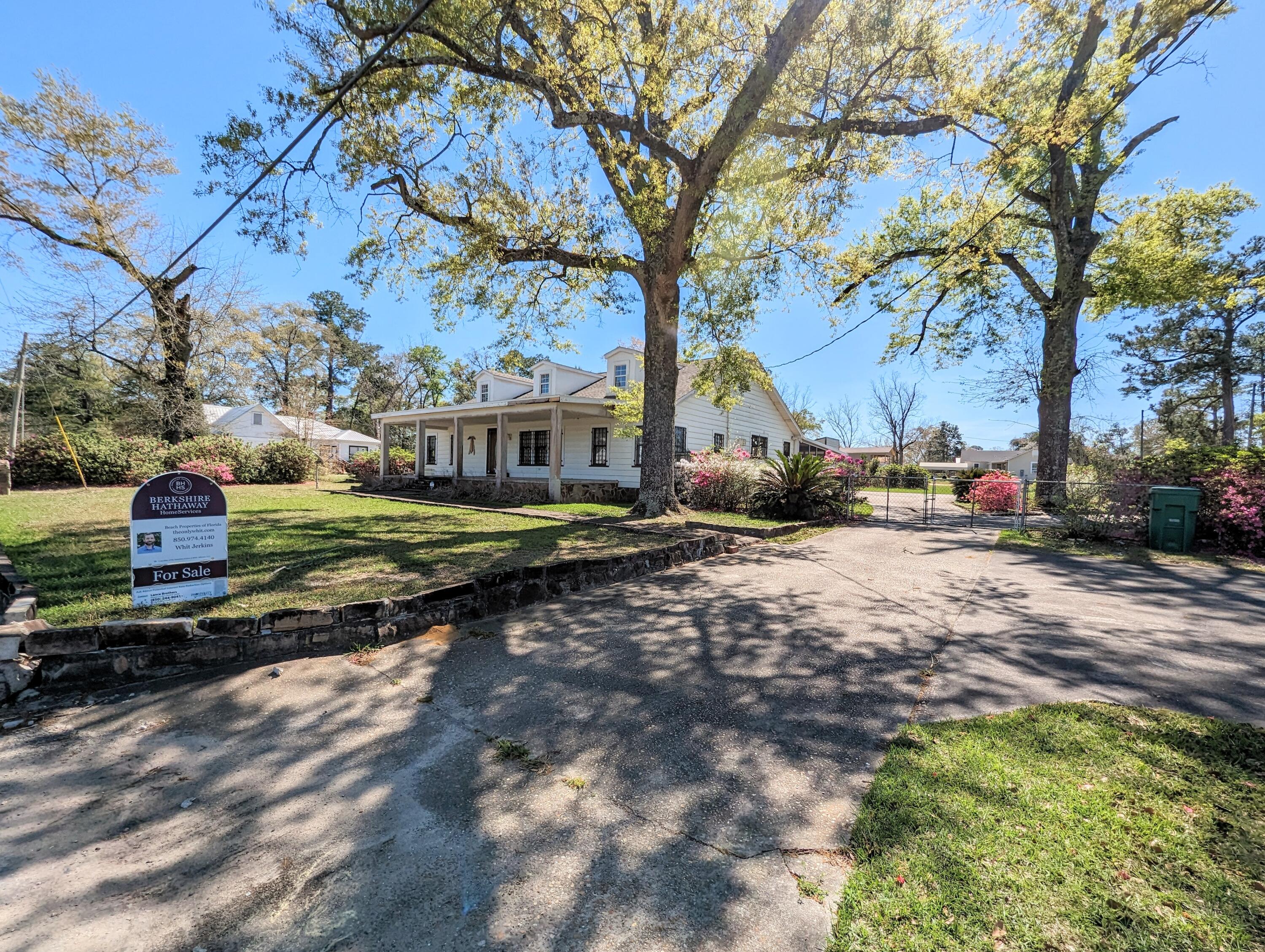 Back on the market! Bring all As-Is Offers!Are you looking for a new investment opportunity? Look no further! This spacious 1873 sq ft home is located within the city limits of Chipley and sits on a double lot, totaling 0.7 acres. The home has is ready for a new owner to bring it back to its full potential and make it their own. With original hardwood floors throughout the living room, dining room and bedrooms and spacious areas, you will find plenty of ideas on how to make this house a home.The home does have a covered front porch that welcomes you into a living room with a gas fireplace, a formal dining room area connected to the kitchen, and 3 bedrooms and 2 bathrooms downstairs. One bedroom has a separate entry door that can be a lockout suite.