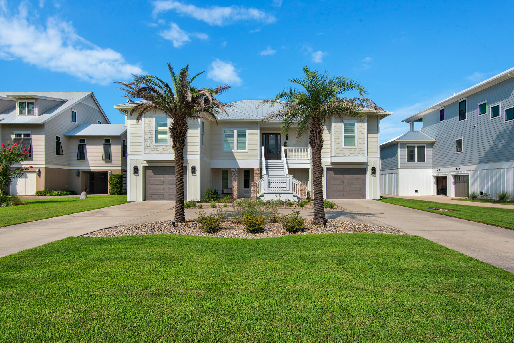 Welcome to Bay Harbour! This beautiful custom home is positioned to offer the most stunning sunsets on Choctawhatchee Bay. This home was designed with a coastal lifestyle in mind starting with the boathouse with boat lift and two waverunner lifts. The lower dock is perfect for launching paddle boards. Outdoor entertaining is so easy with the outdoor kitchen alongside the pool with hot tub. The open floor plan allows exquisite bay views from the Living Room, Dining Room and Kitchen that features all KitchenAid appliances, quartzite counter tops and a walk in pantry. The Master Bedroom also offers bay views and opens right on to a charming sitting area on the screened porch. Two spacious closets flank the hall to the Master Bath that has a stand alone tub and separate shower. The additional Bedrooms and Bathrooms are ample in space and storage.
The majority of the first floor is garage/storage with the exception of a large heated and cooled space that also has a full Bathroom. This space is not included in the 3090 sf. It is easily accessible from the pool deck and outdoor kitchen.
You must see this one to appreciate it! Come see what Bay Harbour has to offer!