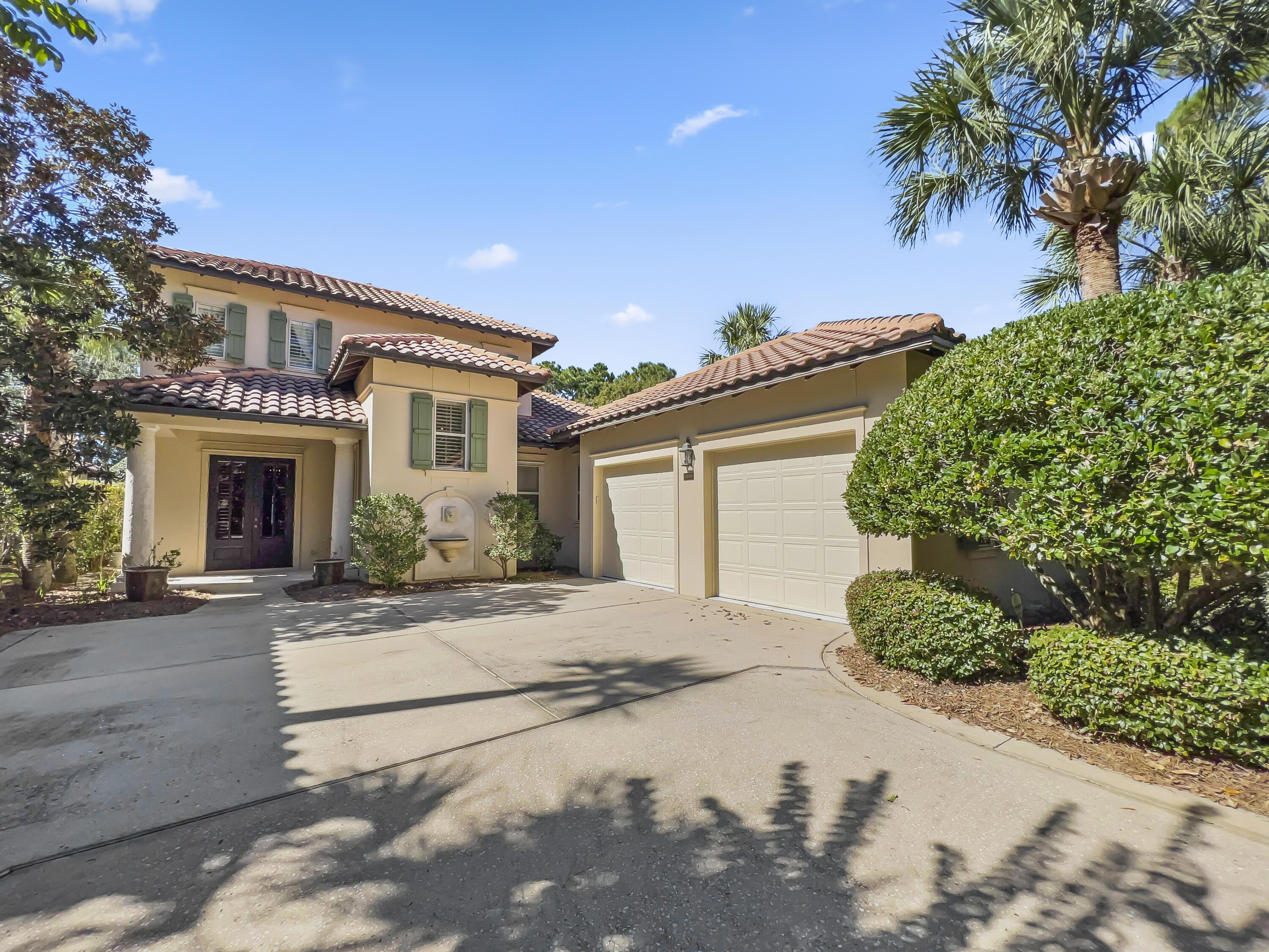 NEW PRICE! If you think you've seen the ultimate golf course home in the Vineyards in the Sandestin Golf & Beach Resort, think again. Located on #7 Raven golf course..... A MUST SEE! Home is being sold furnished with Cadillac Escalade 6 seat golf cart! Home features a large, heated open-air pool and privacy landscaping provides plenty of room for sunning and nighttime relaxing. Charleston courtyard garden lures you out the French doors from the master bedroom and is low maintenance. Designer kitchen built for entertaining with ''Cabinets by Design'' touches encompassing extensive storage and a beautiful pantry/bar/wine cooler alcove unique to this home. Built-in cabinetry in the living room, master bedroom and richly finished office with beveled glass doors.