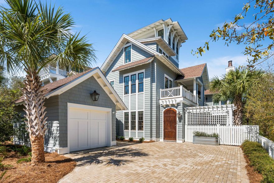 Embrace the extraordinary at this impeccably crafted 5BR/5.5BA masterpiece nestled within the gated WaterSound Beach community with every accoutrement of luxury living including an expansive outdoor living area, private plunge pool, summer kitchen, two-car garage, elevator, and fourth level tower with stunning Gulf of Mexico and neighborhood views. Every facet of this home exudes opulence from the chef's kitchen adorned with top-of-the-line Wolf and Sub-Zero appliances to the open-concept living spaces highlighted by oak floors, painted brick accents, and airy wood beamed ceilings. A symphony of elegance and functionality, the ground level beckons with a grand foyer seamlessly flowing into the expansive living and dining areas and effortlessly extending to the veranda and outdoor oasis.