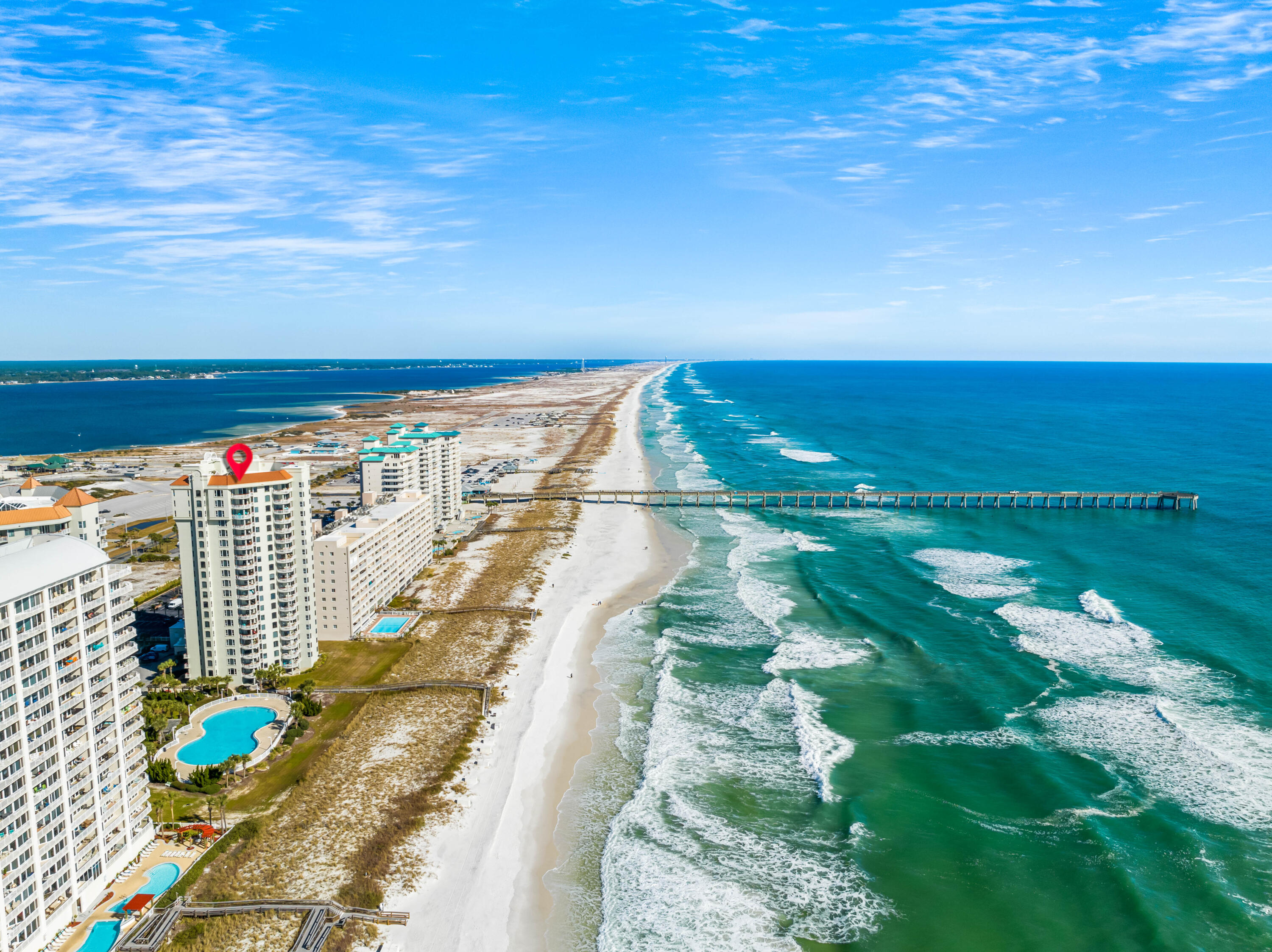 BEACHFRONT CORNER UNIT WITH VIEWS OF GULF OF MEXICO AND SANTA ROSA SOUND! Located in the Beach Colony Condominium, this 3 Bed 3 Bath retreat provides a cozy Beachfront getaway.Its expansive living spaces are filled with abundant Natural Light and views of the Gulf and Sound can be seen from multiple rooms. The Kitchen features granite countertops, ample storage, and a wine cooler. The open floor plan seamlessly connects the kitchen to the dining nook and living areas, creating a perfect setting for entertaining or quality time with friends/family. All 3 bedrooms boast an ensuite bathroom, providing ultimate privacy and convenience. In the master suite, you'll find a large walk-in closet, a balcony ...