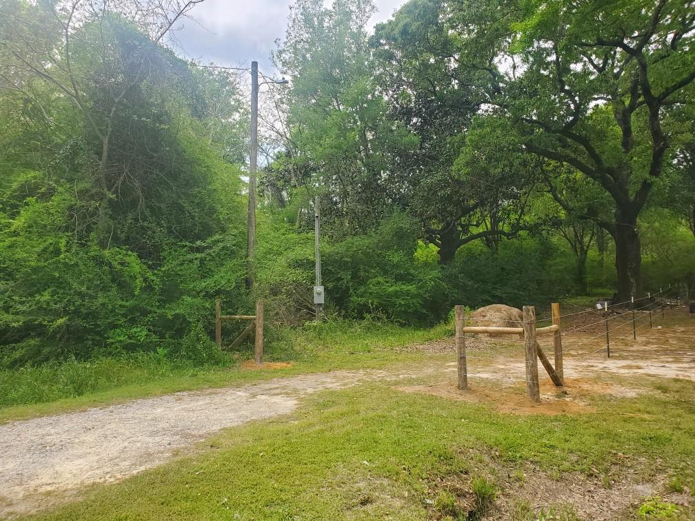 Must See!! This 2 acre lot is located in beautiful Laurel Hill, just a short drive from Lake Jackson. It is equipped with power and a 50 amp connection ready for your RV. Perfect for your stay to overlook your new build, manufactured, or tiny home. Approximately 1/3 of an acre already cleared. no sign on property. survey available. All measurements are approximate.
