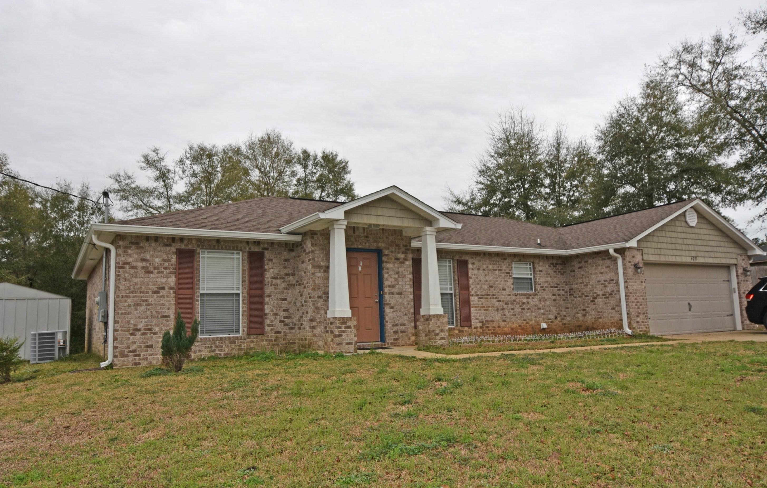 Easy to Buy and Maintain! Seller is offering to pay most closing costs on this ALL Brick 3 bedroom 2 bath home located near the NEW Publix shopping center. Almost 1 full acre lot provides plenty of room to roam, and TWO yard buildings for all your storage needs. New Laminate wood flooring in the living and dining area, plus granite kitchen counters and pantry. Split bedroom design with an Eat-in-kitchen and Separate Dining area. Private Master Suite is located on the back side of the kitchen. Master bath is equipped with dual vanity and dual walk-in-closets. Greenbelt view with lots of privacy as this lot adjoins county owned land. SCHEDULE YOUR VIEWING TODAY! Closing costs paid by seller does not include: prepaids, inspections, escrow set up, 1st yr. insurance, or credit report fees.