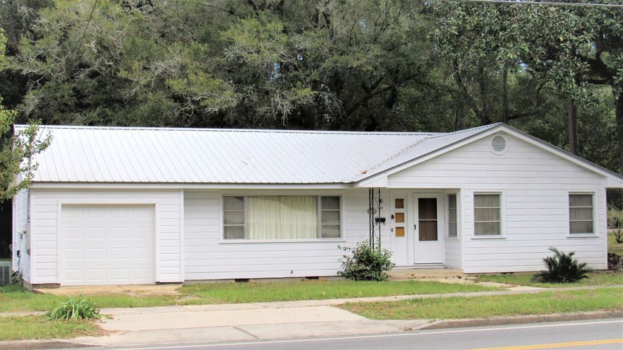 Priced below appraised value! Location, Location, Location! Located just a few blocks from the Downtown Historic District, you will find this Charming Florida Cottage! Convenient walking distance to shopping, restaurants and stores. Don't miss the opportunity to own this well taken care of beauty. This 3/2, 1,619 sq.ft. home comes complete with metal roof and updated central a/c. Home features include a large living room, formal dining room and cozy Florida room! The master bedroom and additional bedroom are over sized and there is plenty of room in the backyard for your workshop or greenhouse! With a change in zoning, you could potentially change this home/lot to commercial use. There is so much potential for this home! Don't miss out, call for your tour today!